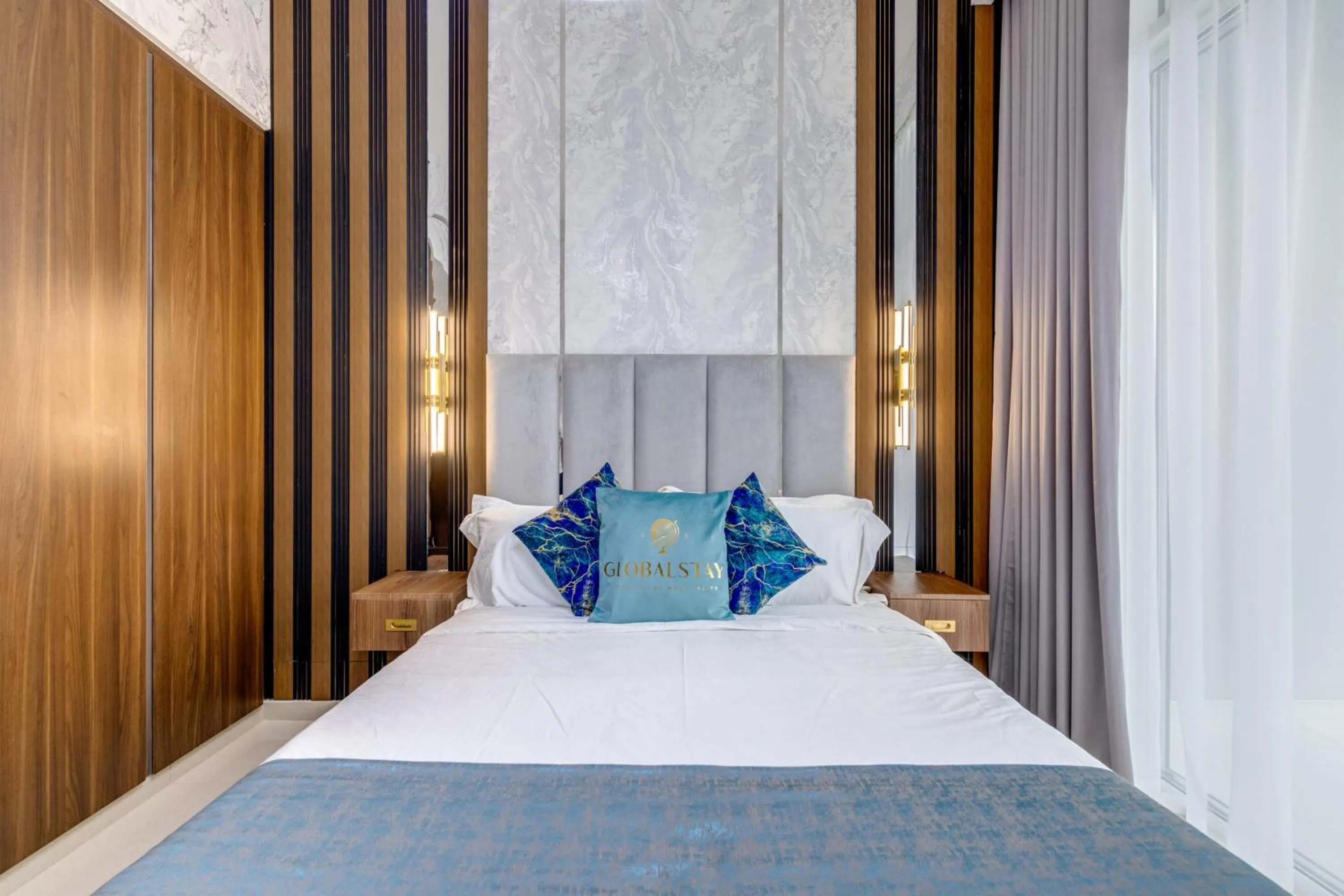 Bed in GLOBALSTAY. Luxury Apartments Near The Dubai Canal