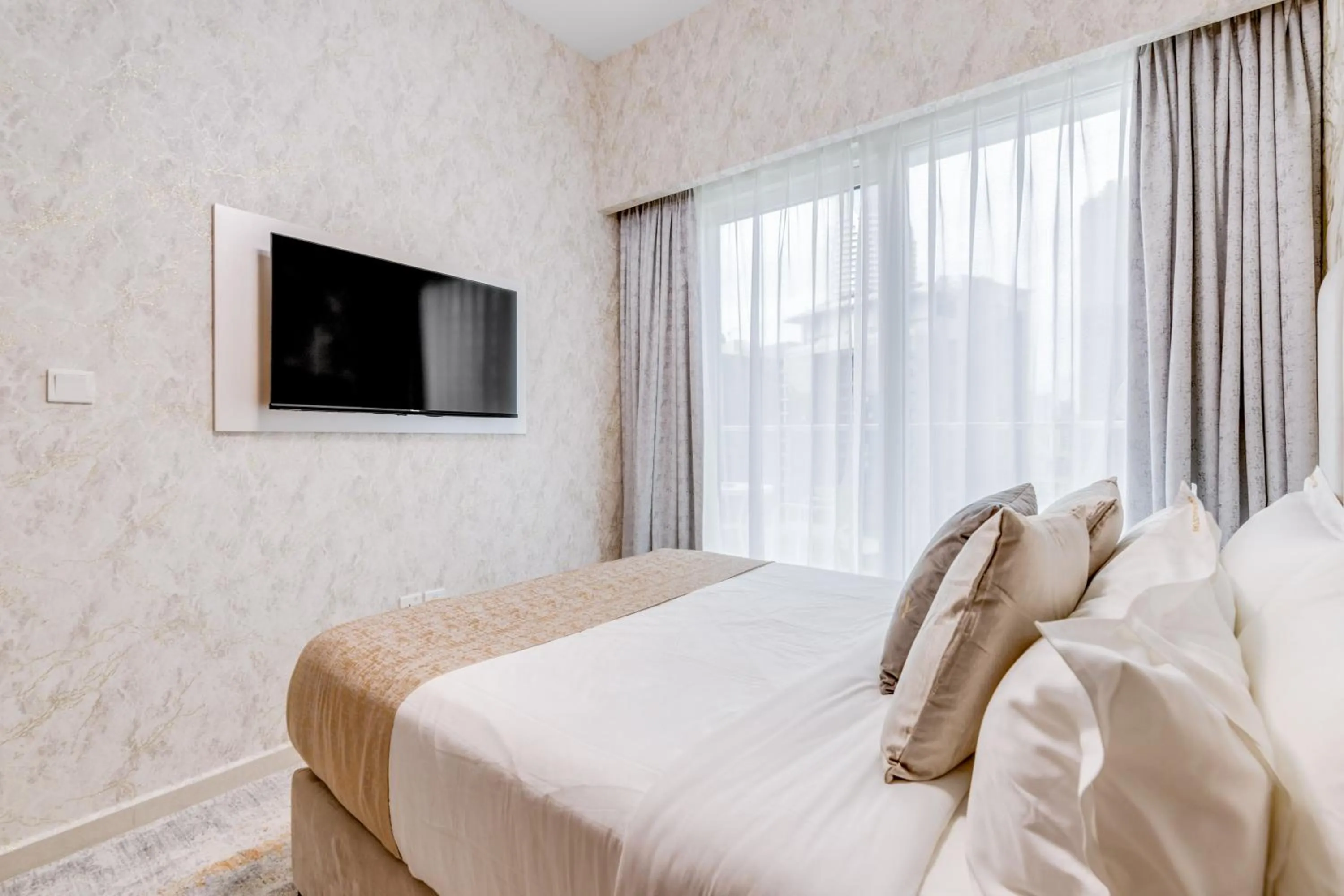 Bed in GLOBALSTAY. Luxury Apartments Near The Dubai Canal