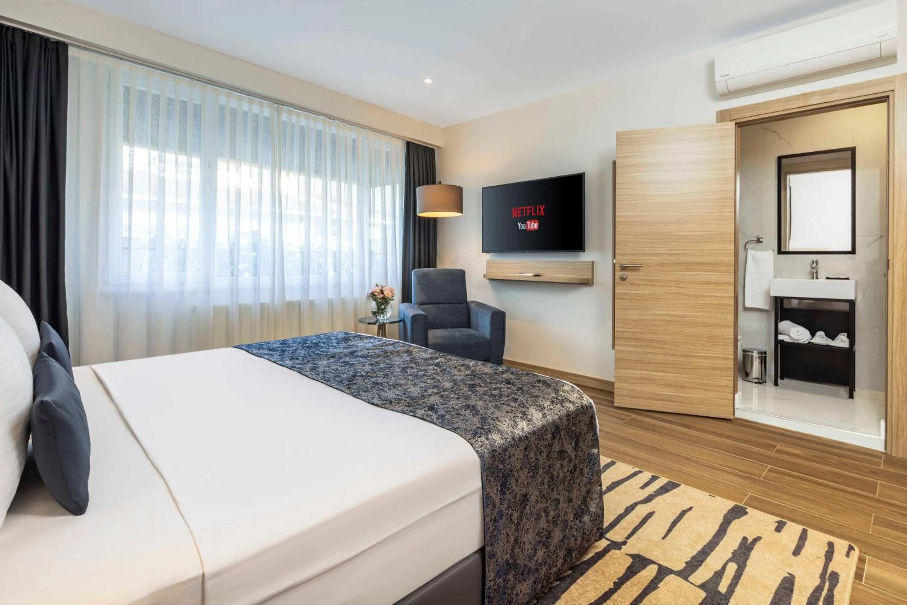 Photo of the whole room, Bed in The Capri Hotel Osmanbey