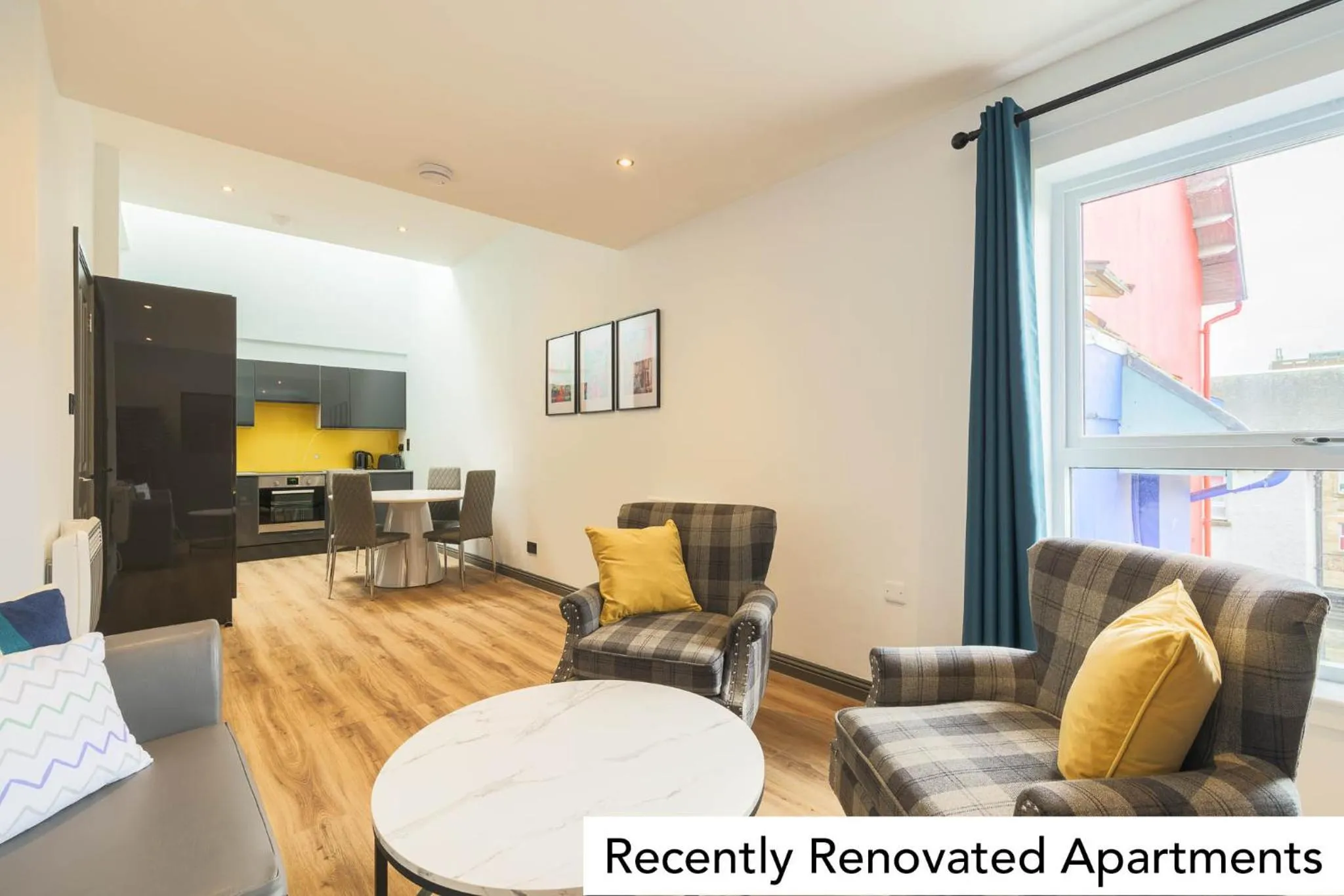 Communal lounge/ TV room in Holyrood Aparthotel