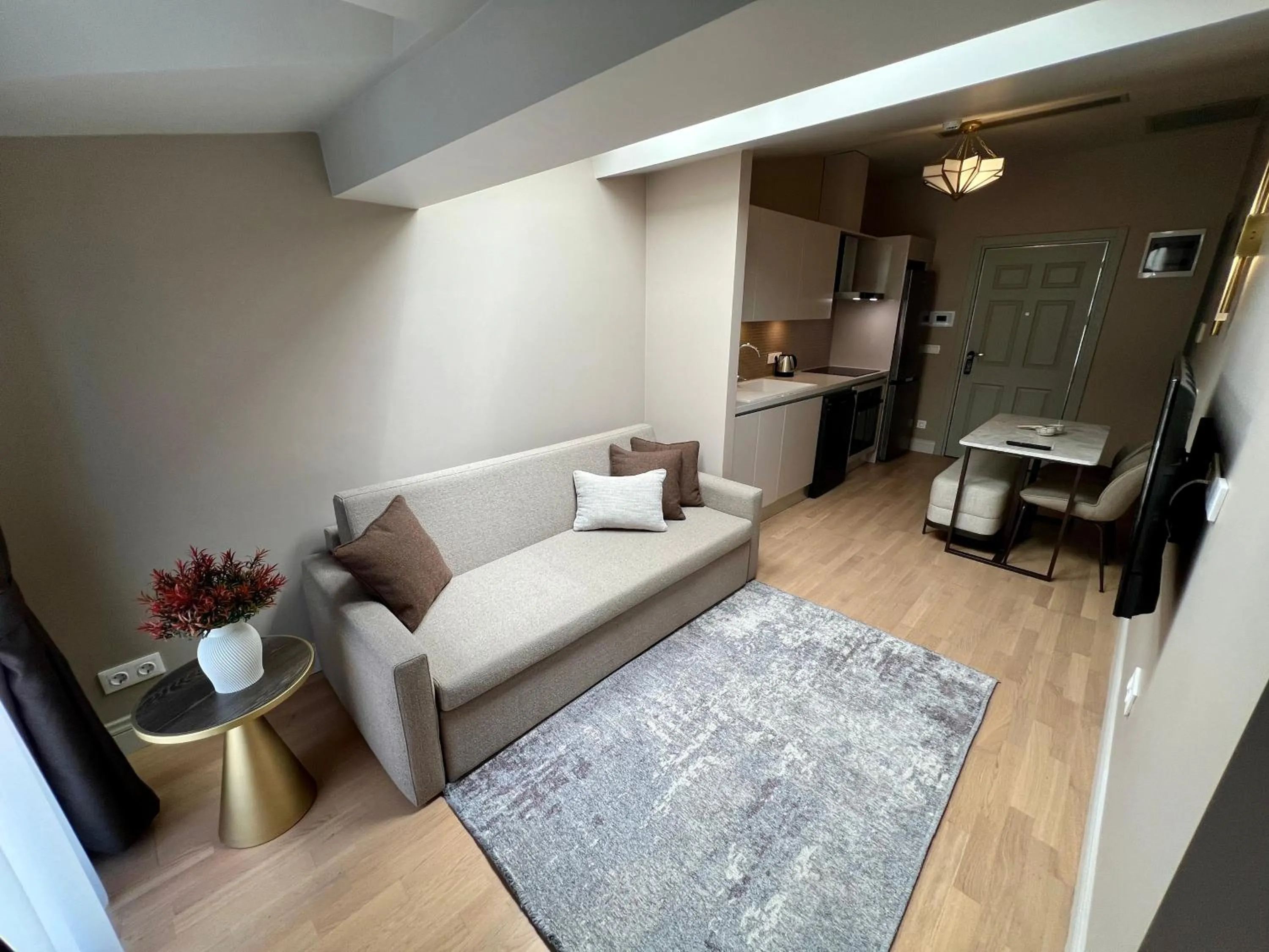 Kitchen or kitchenette in Weingart Suites Hotel