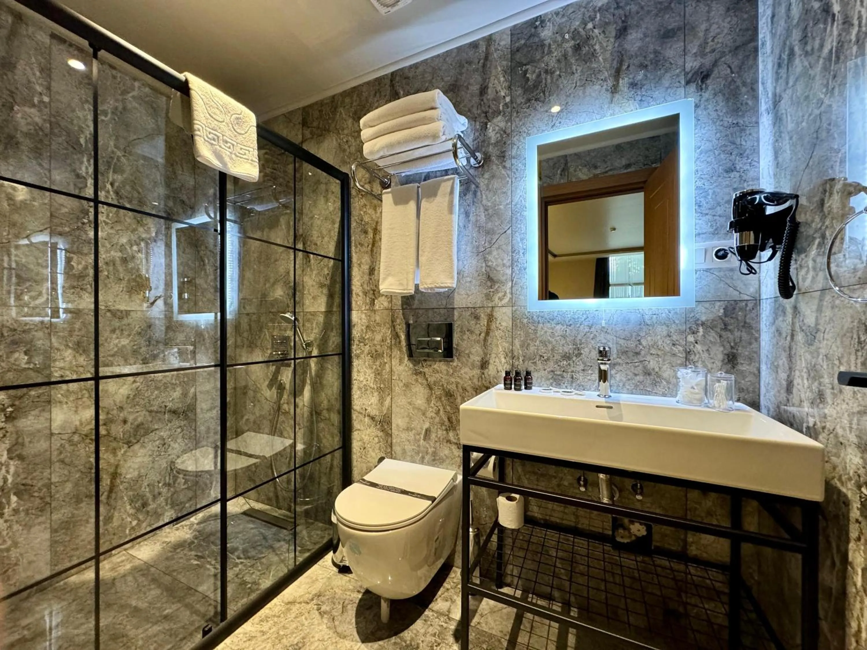 Shower in Weingart Suites Hotel