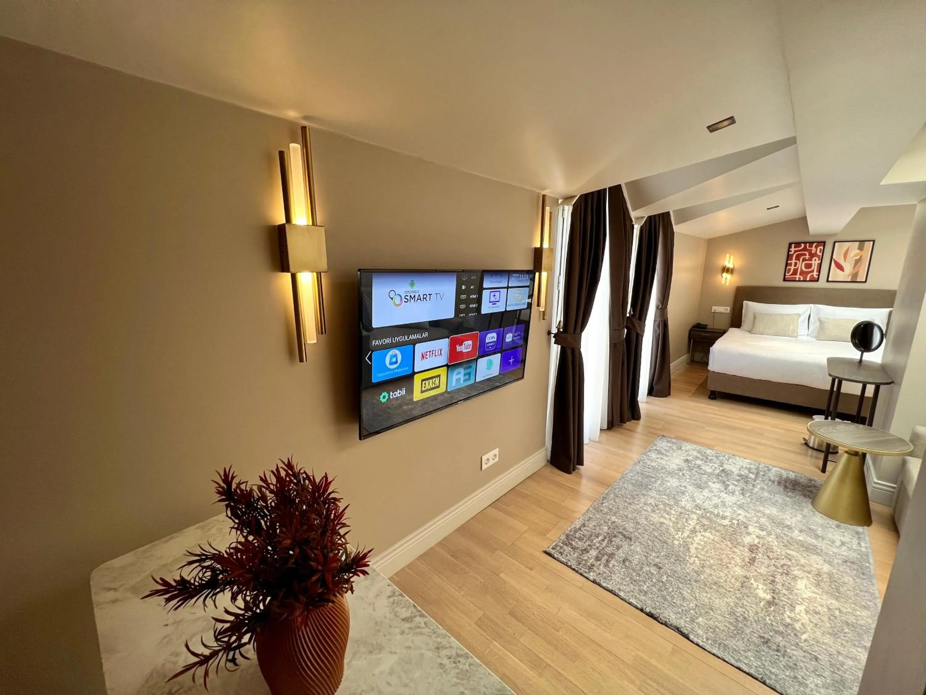 Bed in Weingart Suites Hotel