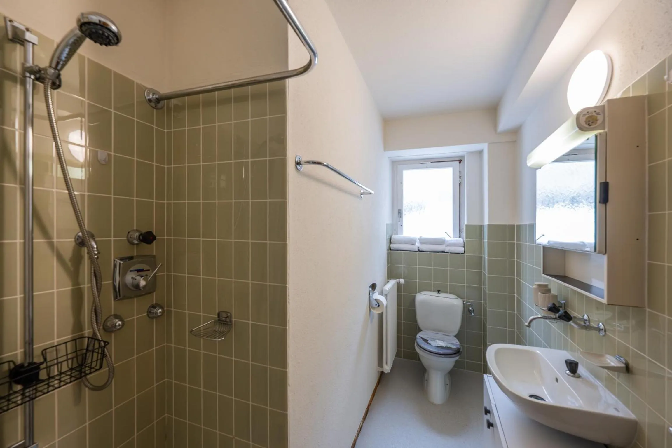 Shower in Chalet-Hotel Larix