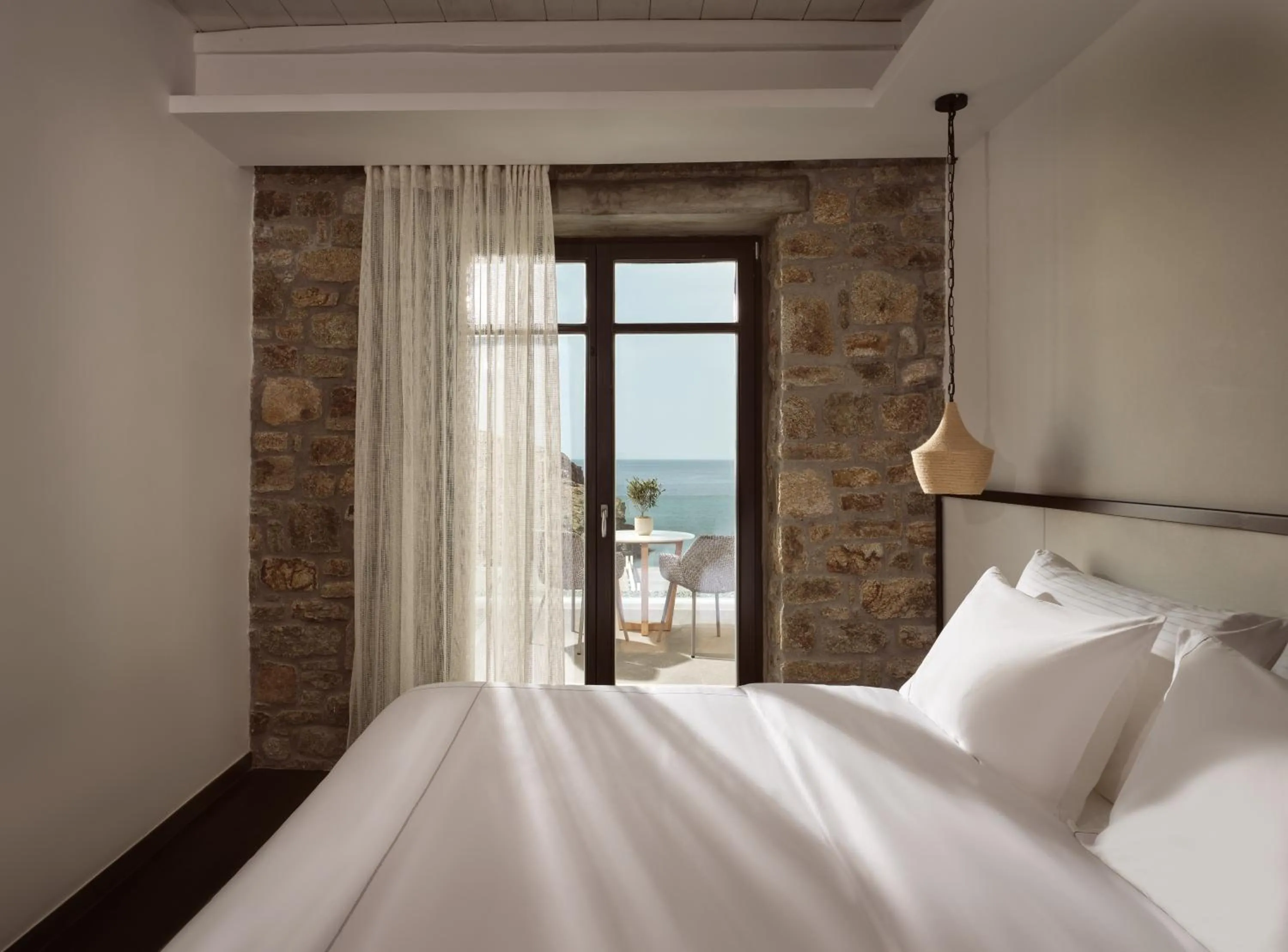 Bed in Semeli Coast Mykonos Curio Collection by Hilton