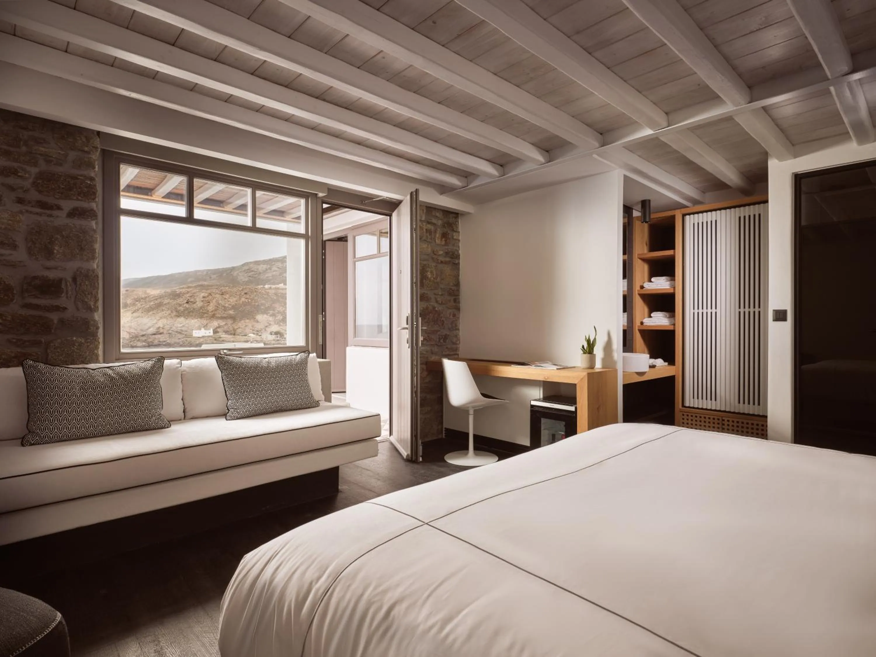 Bed in Semeli Coast Mykonos Curio Collection by Hilton
