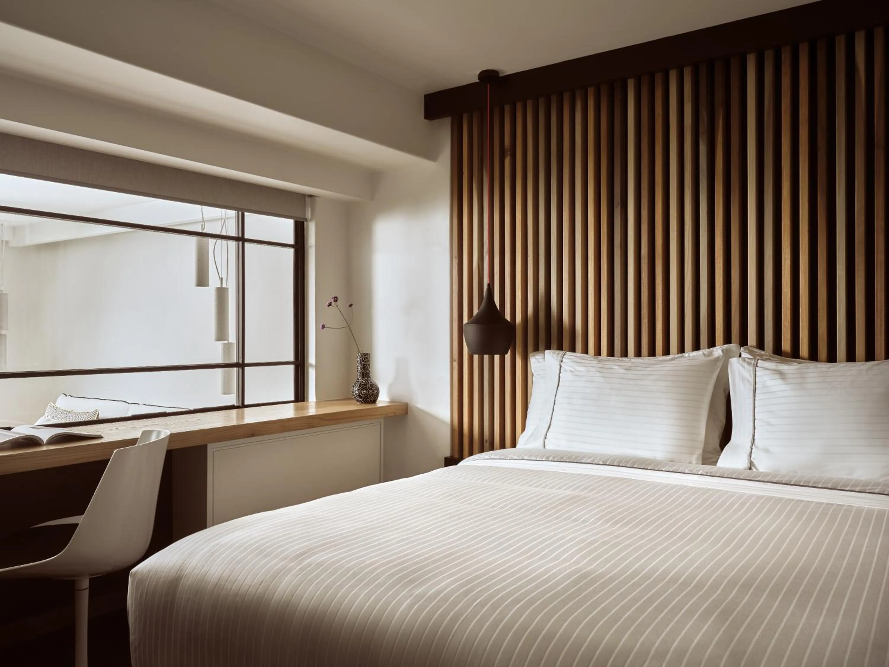 Bed in Semeli Coast Mykonos Curio Collection by Hilton