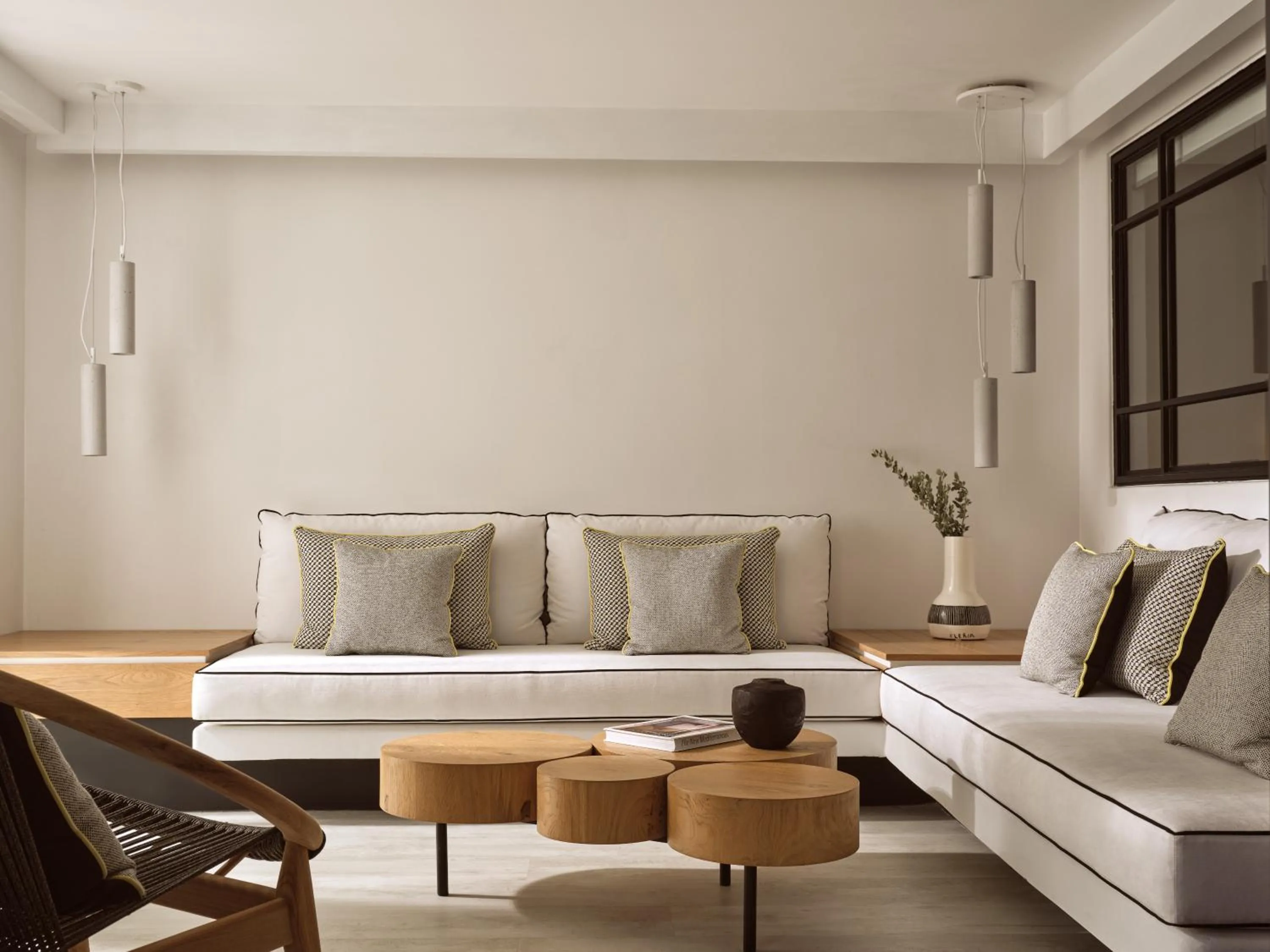 Seating area in Semeli Coast Mykonos Curio Collection by Hilton