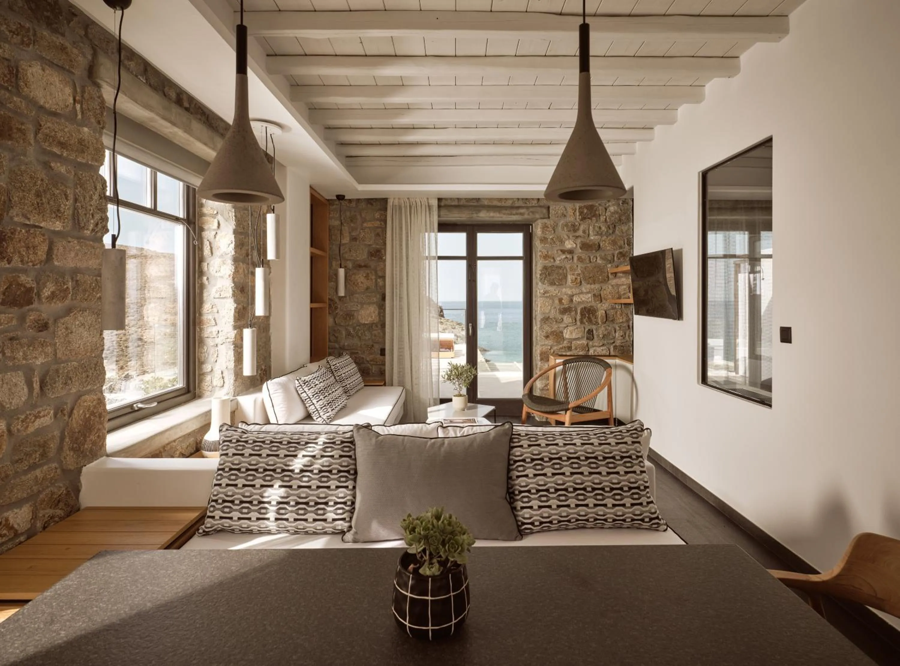 Living room, Bed in Semeli Coast Mykonos Curio Collection by Hilton