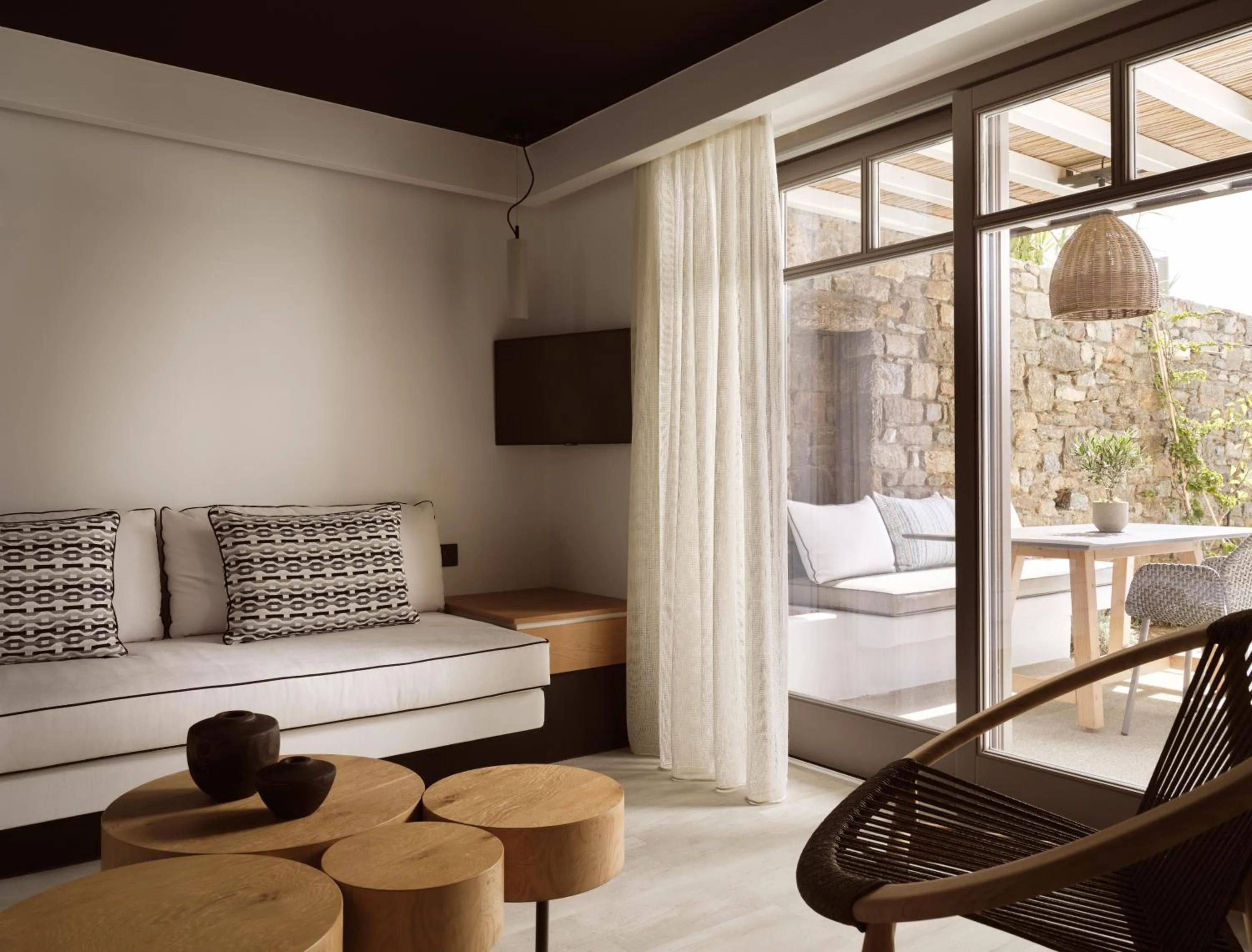 Patio in Semeli Coast Mykonos Curio Collection by Hilton