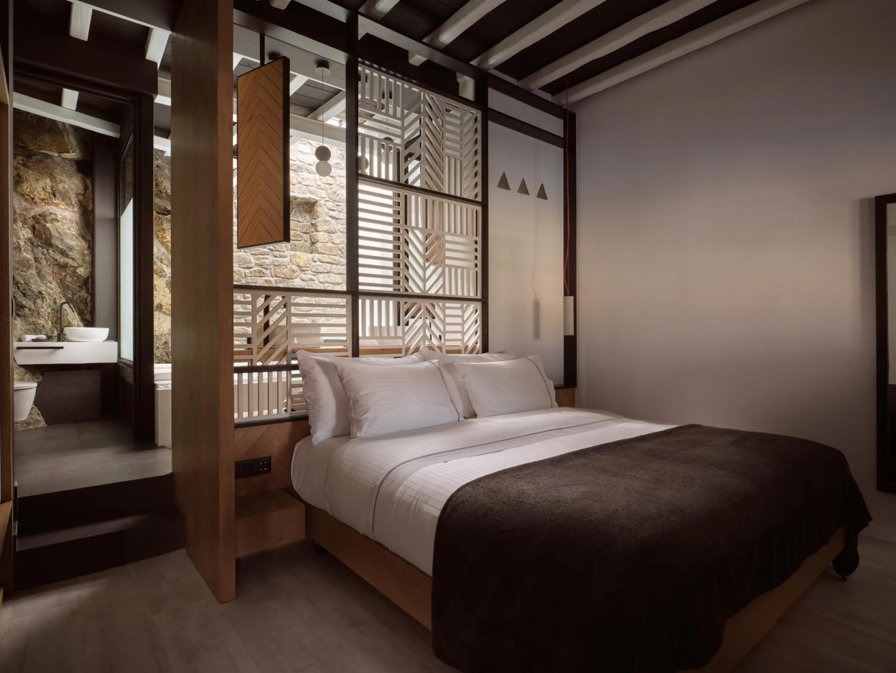 Bed in Semeli Coast Mykonos Curio Collection by Hilton