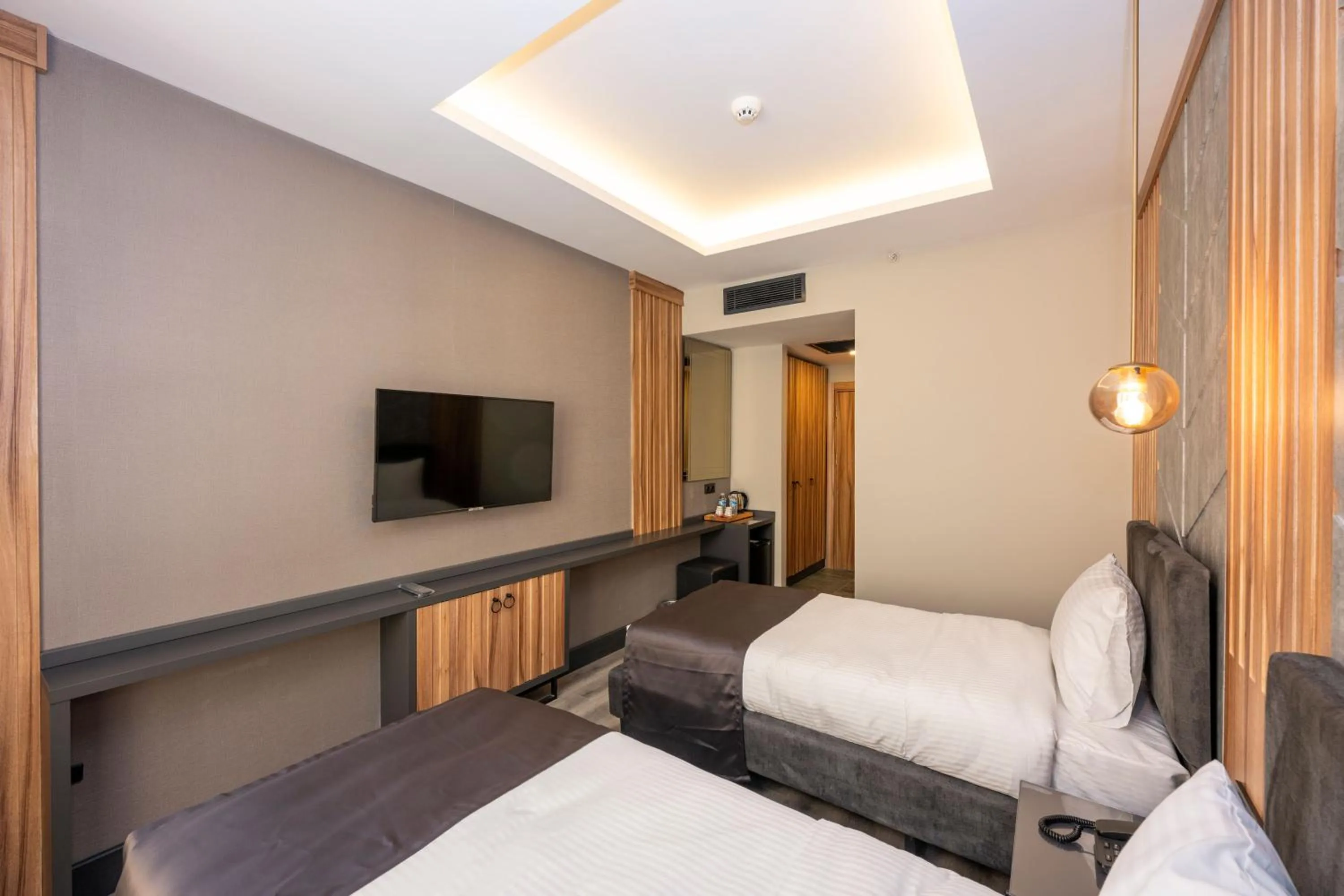 Bed in The Nirvanas Hotel