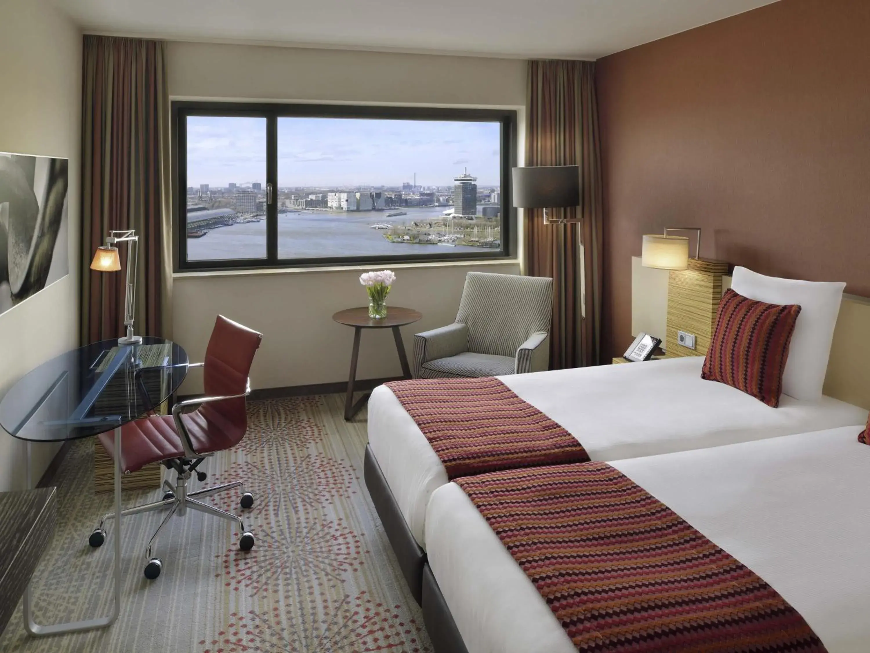 Executive Twin Room with View - single occupancy in Mövenpick Hotel Amsterdam City Centre Executive Twin Room with View - single occupancy in Mövenpick Hotel Amsterdam City Centre
