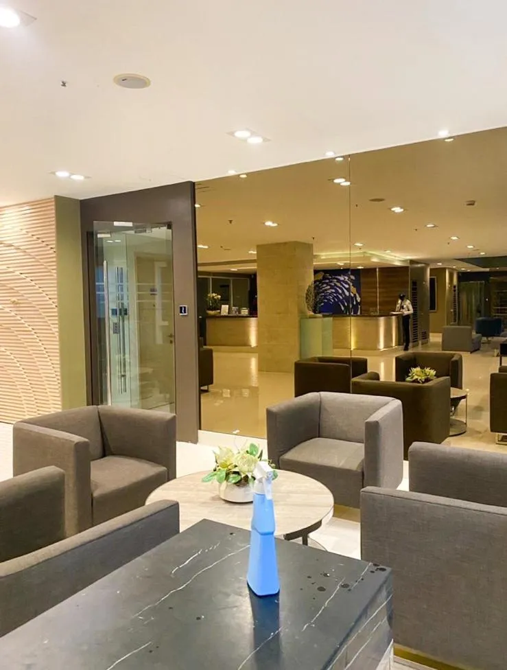 Seating area in Madison Place at Sea Residences powered by Cocotel