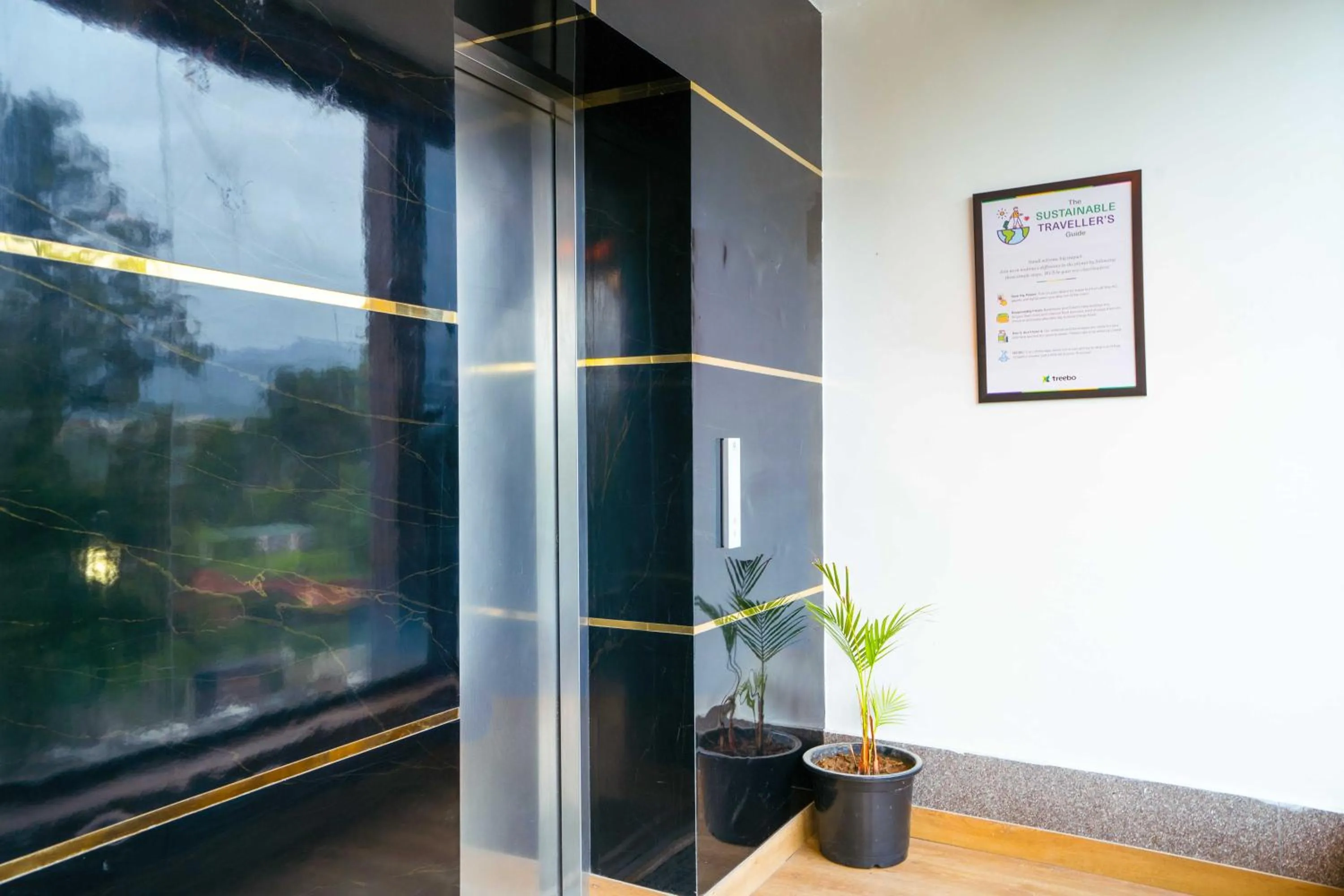 elevator in Treebo White Sand