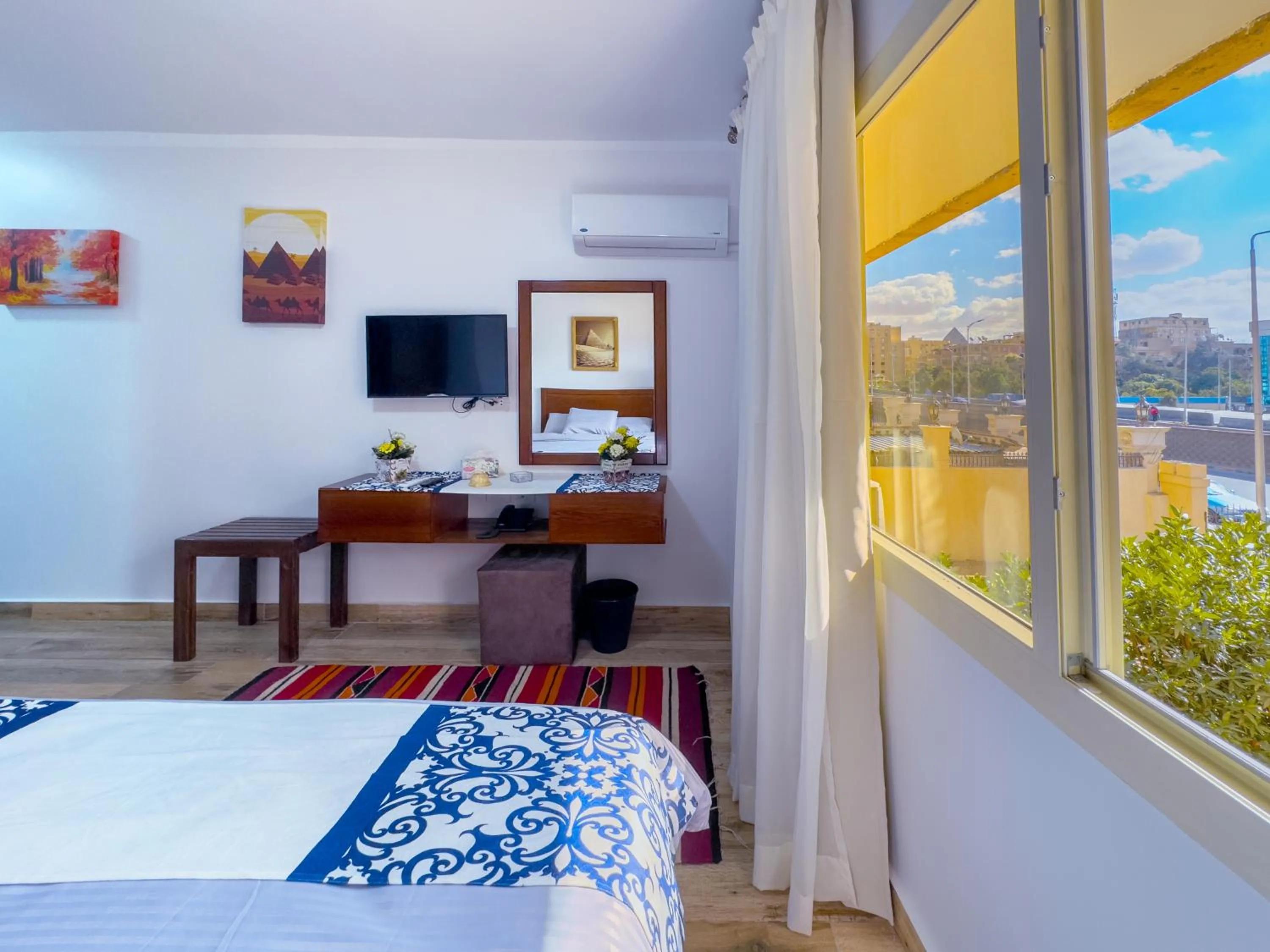 Bed in Royal Crown Hotel Giza Pyramids View