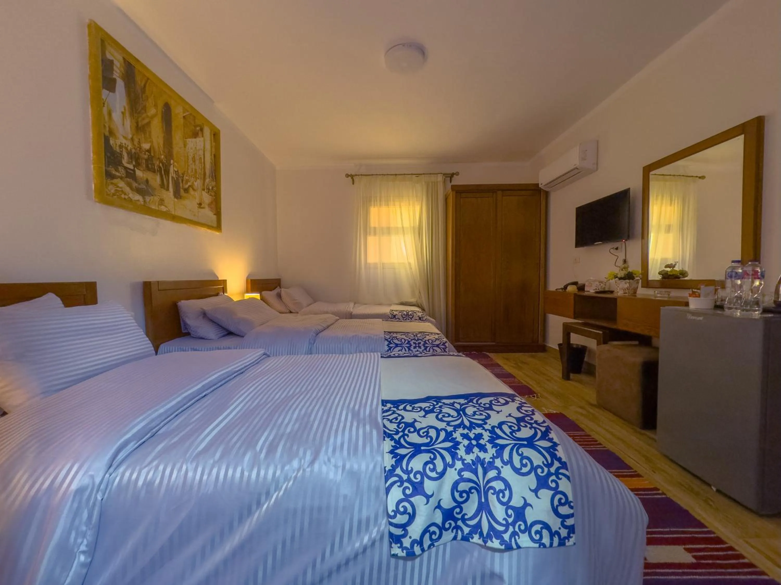 Bed in Royal Crown Hotel Giza Pyramids View