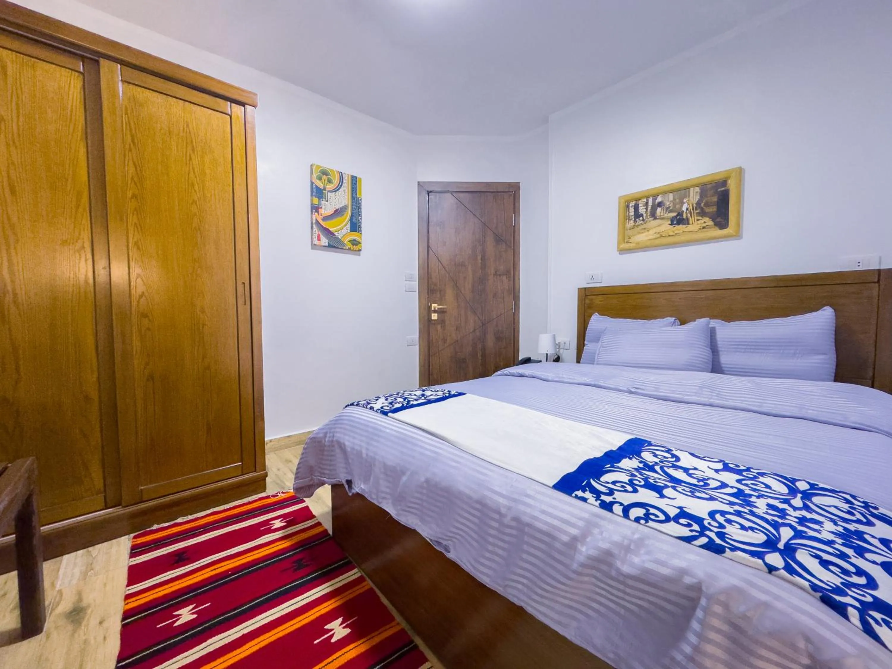 Bed in Royal Crown Hotel Giza Pyramids View