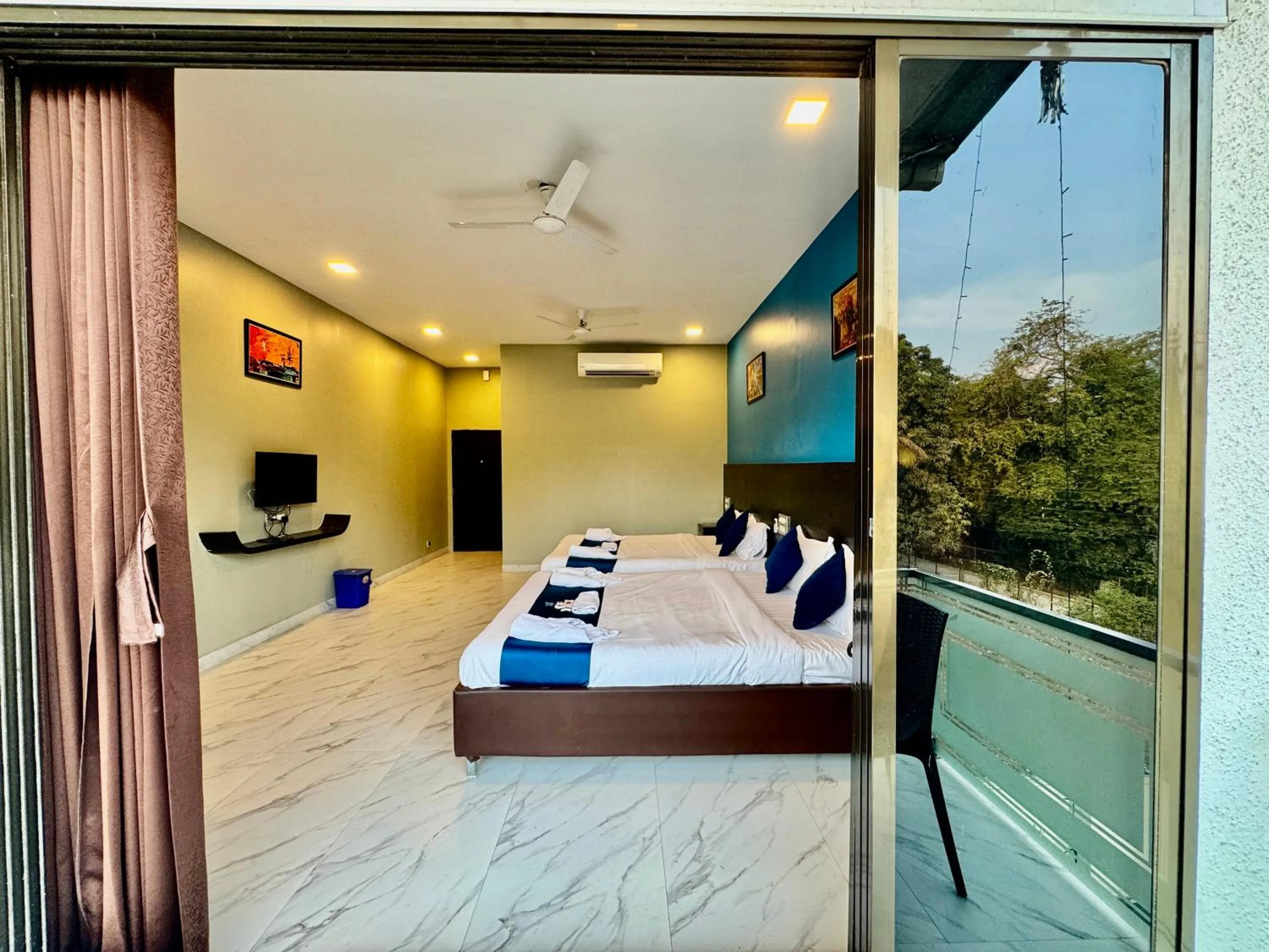 Bed in Golden Pearl Resort By Gemstone Hospitality