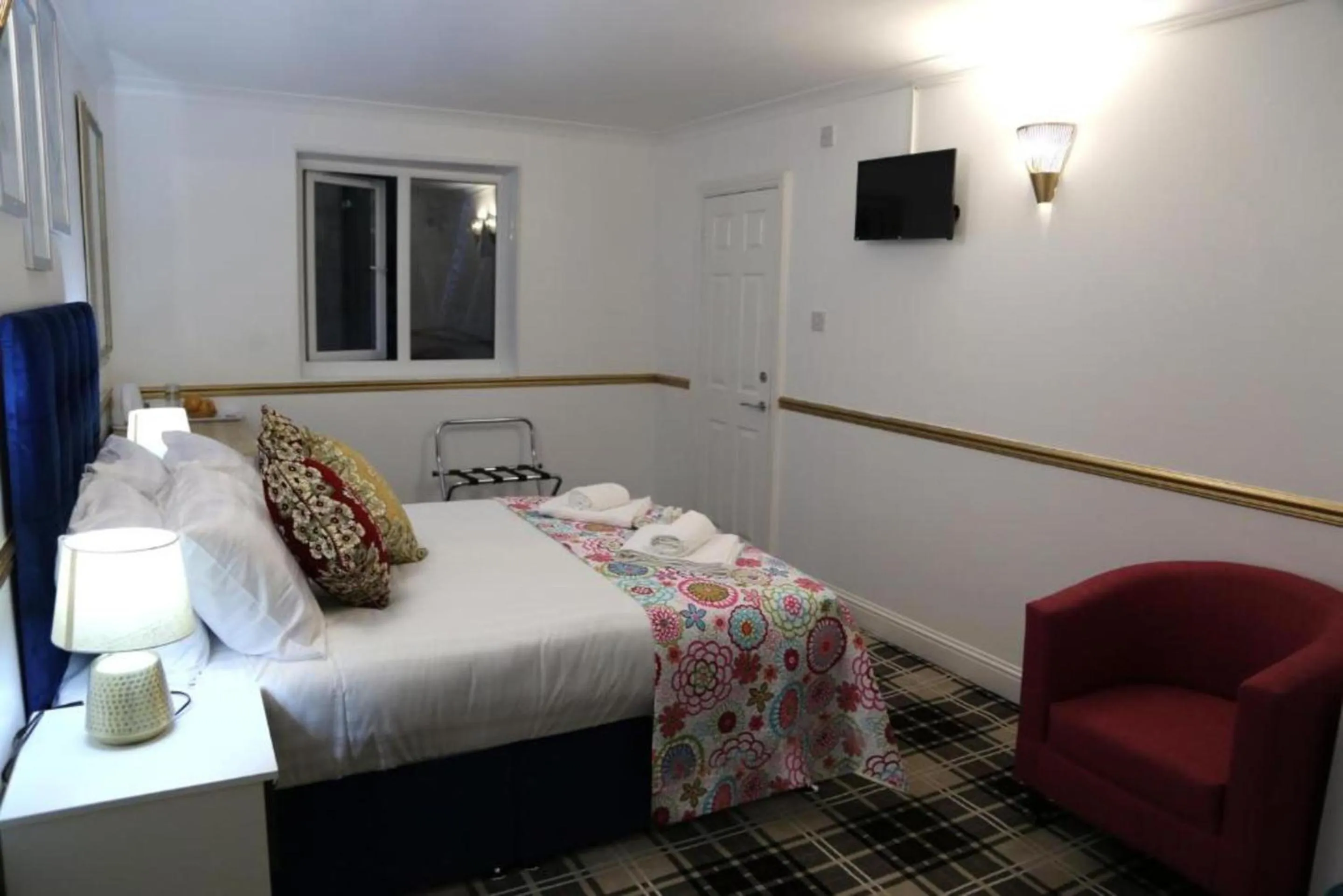 Bedroom in OYO 4 Sisters Inn