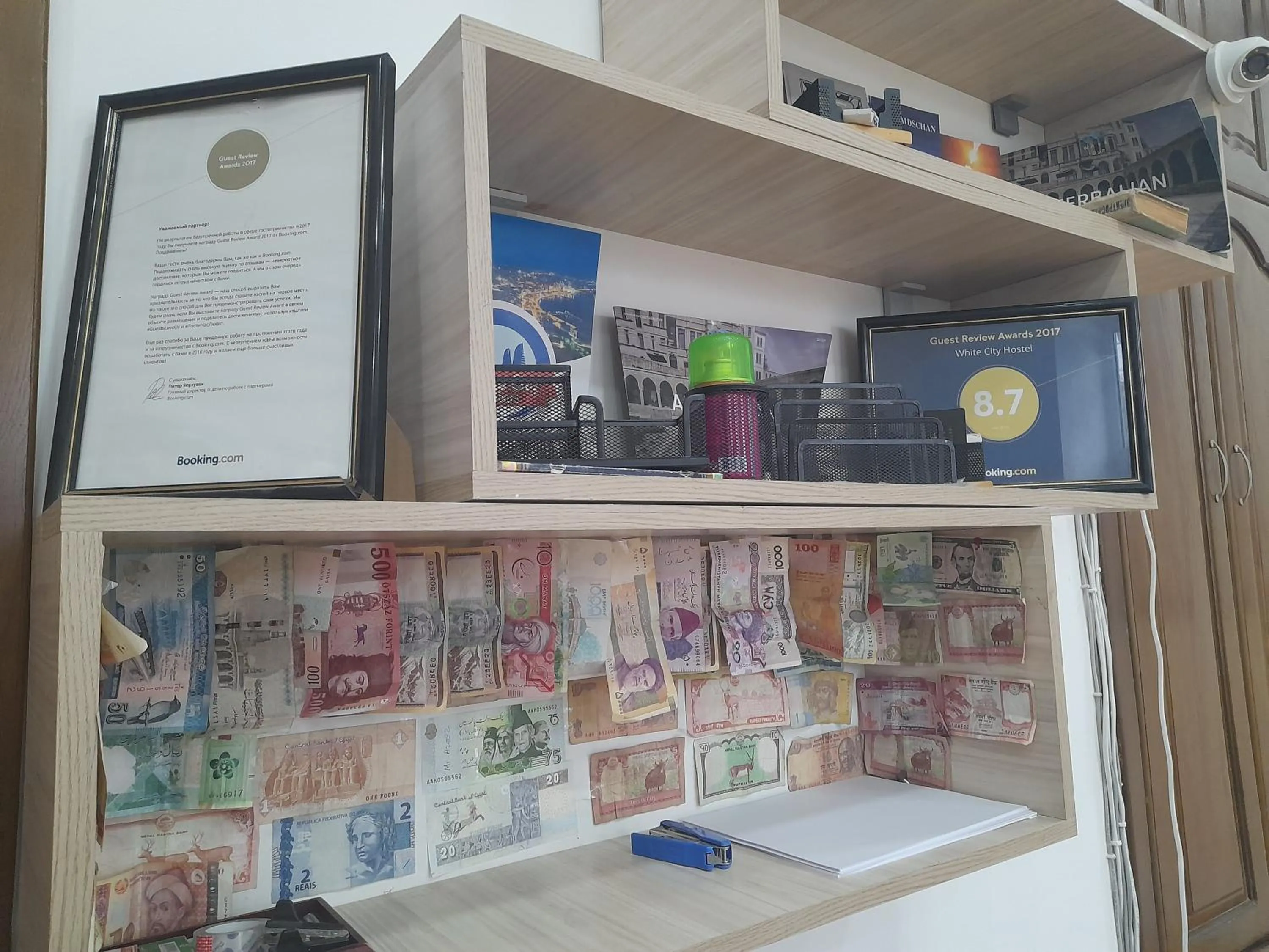 Logo/Certificate/Sign in White City Hostel