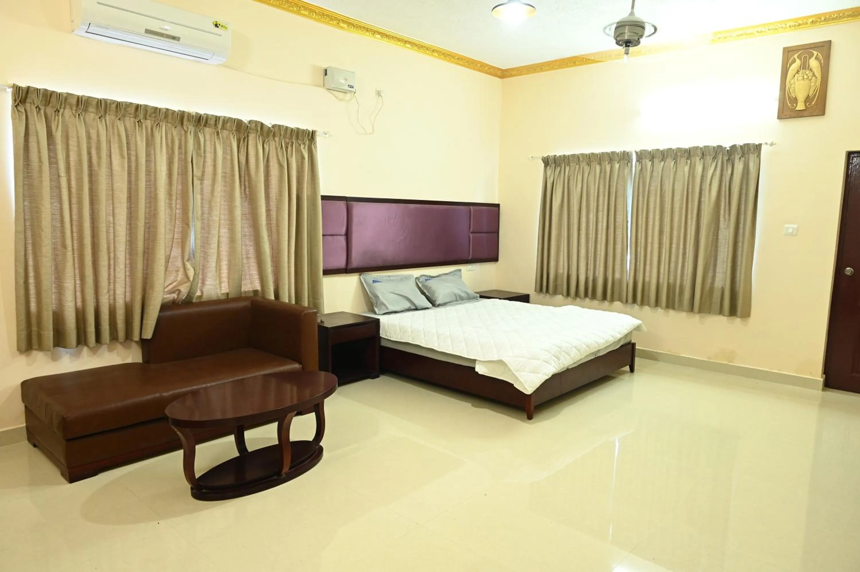 Bed in Athithi Resorts