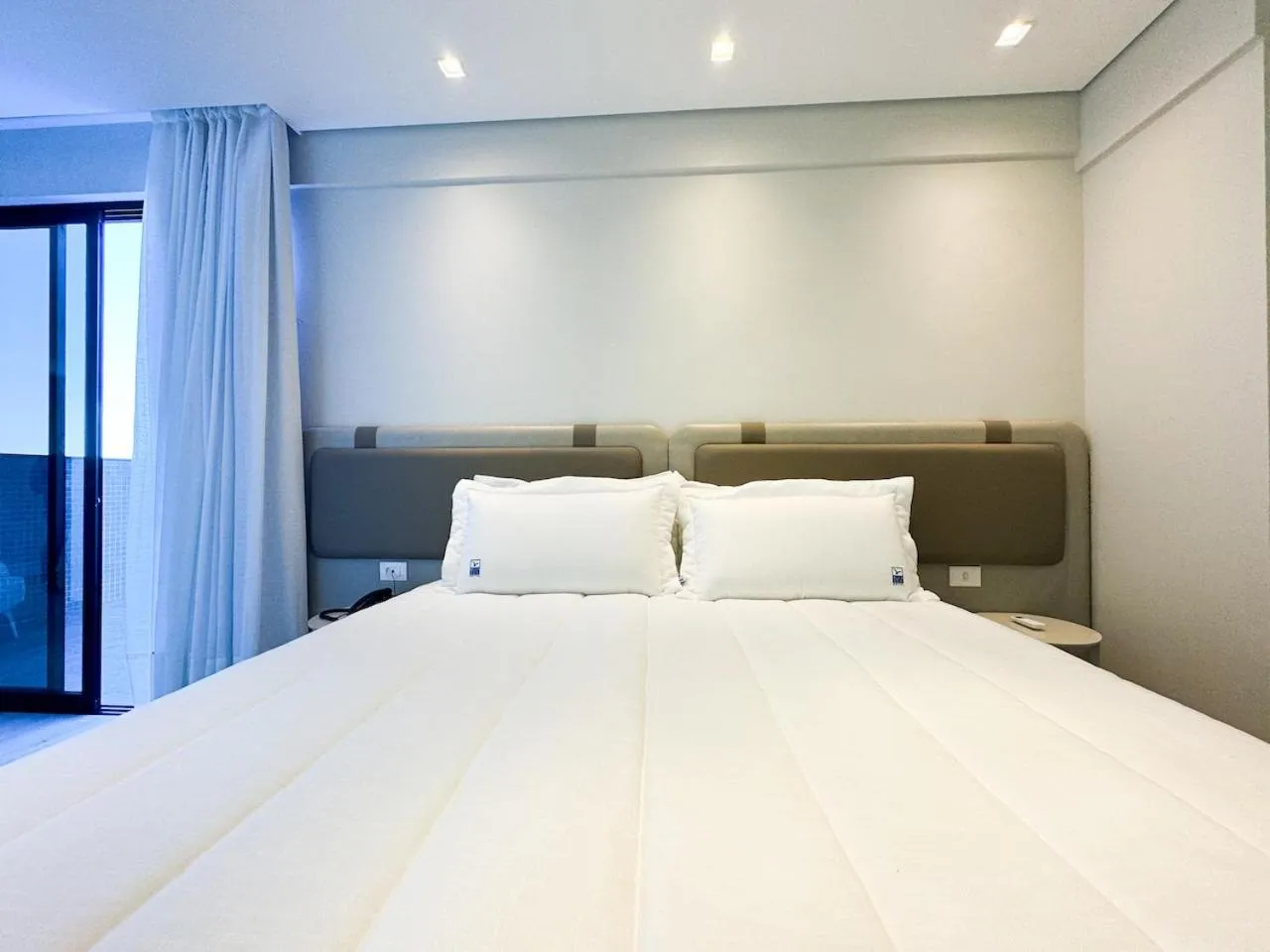 Bed in Blue Sea Hotel