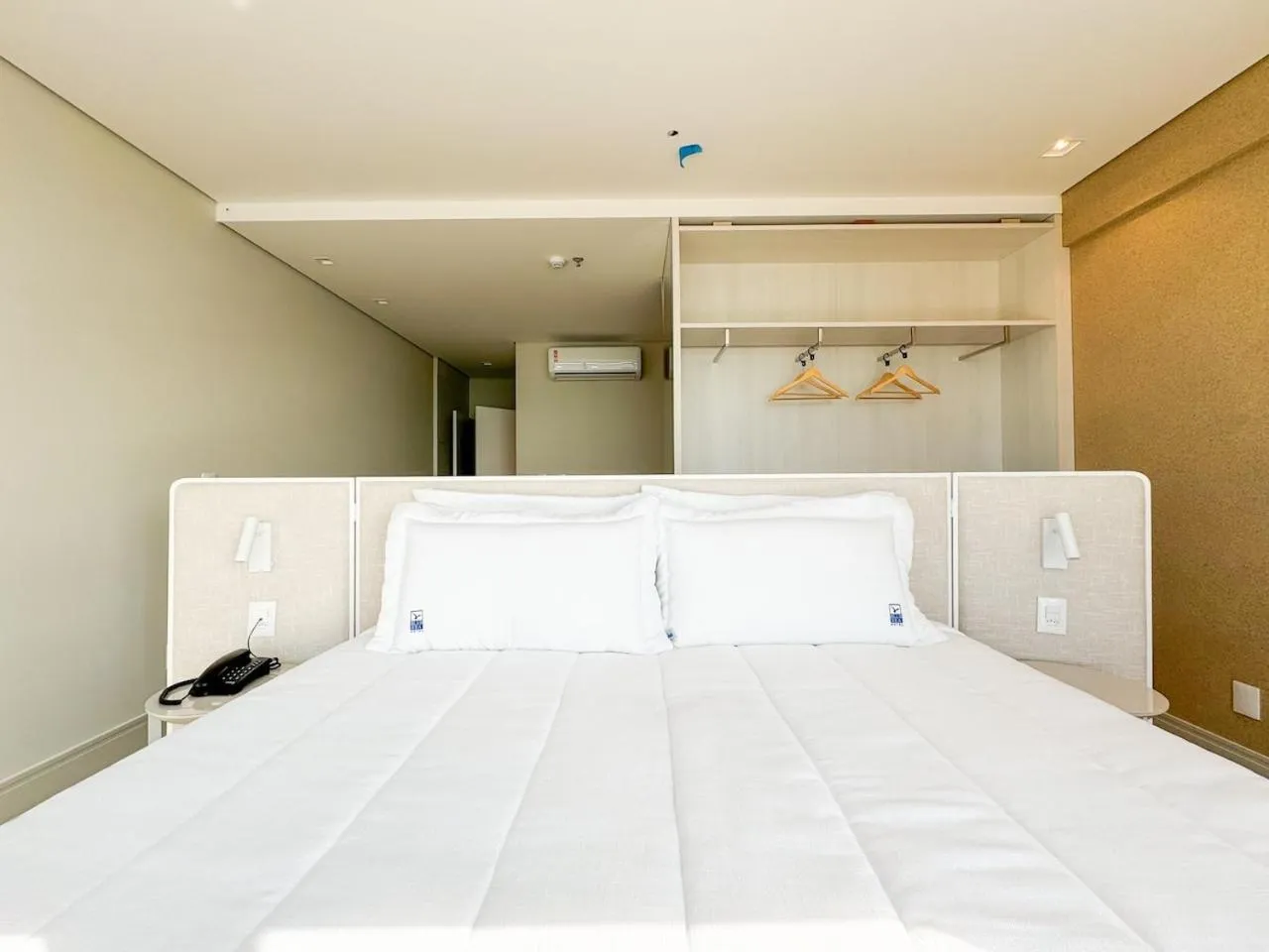 Bed in Blue Sea Hotel