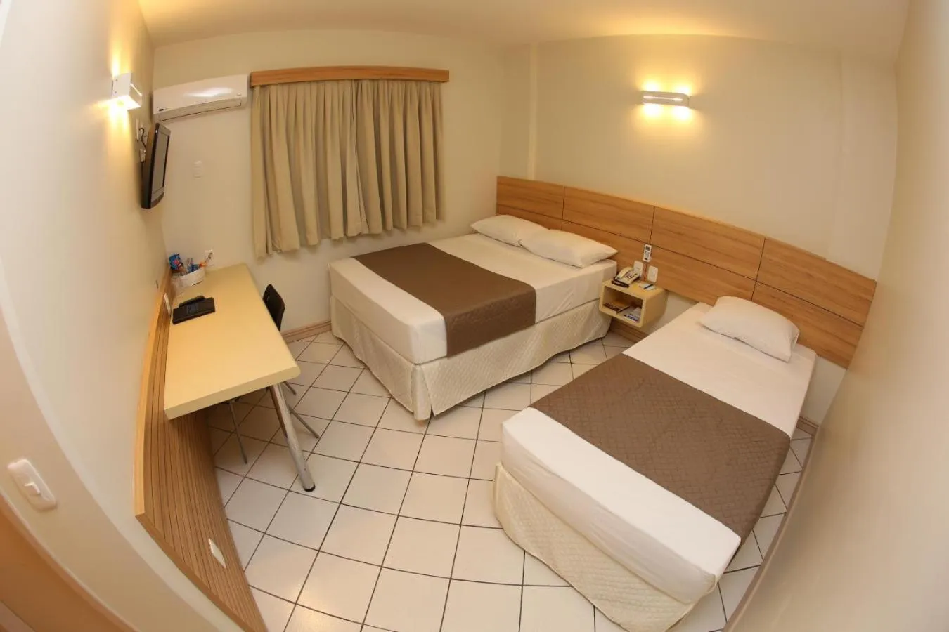 Bed in Hotel Caiuá Express Umuarama