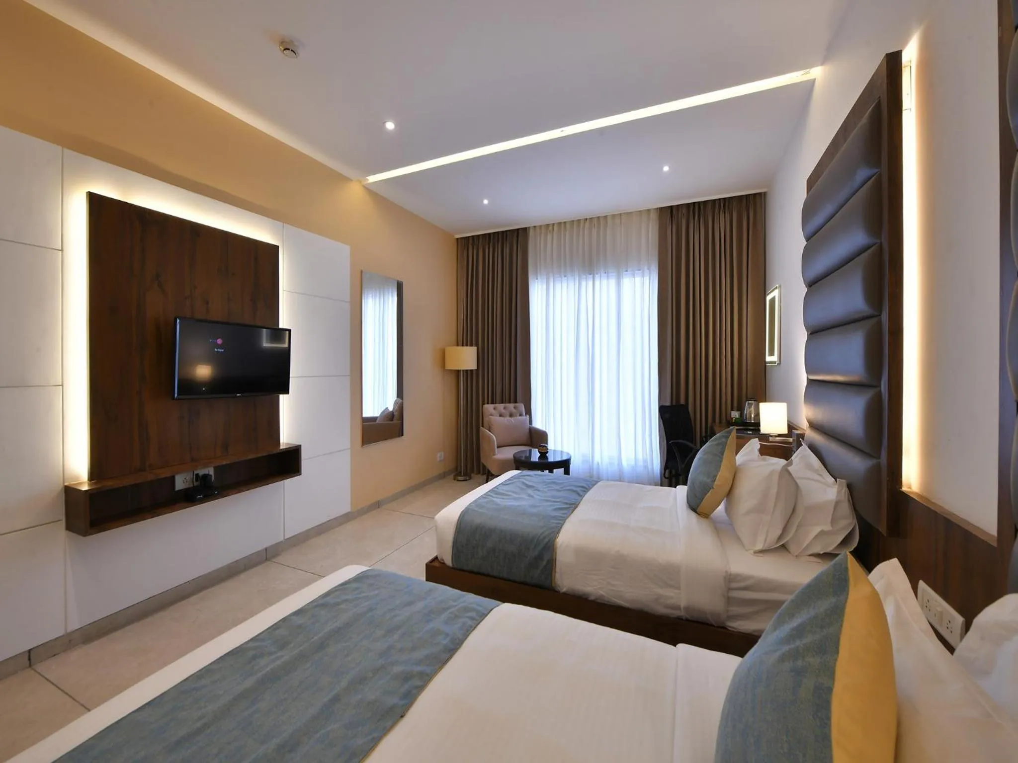 Bed in Clubhouse Hotel by CheckIn Morbi