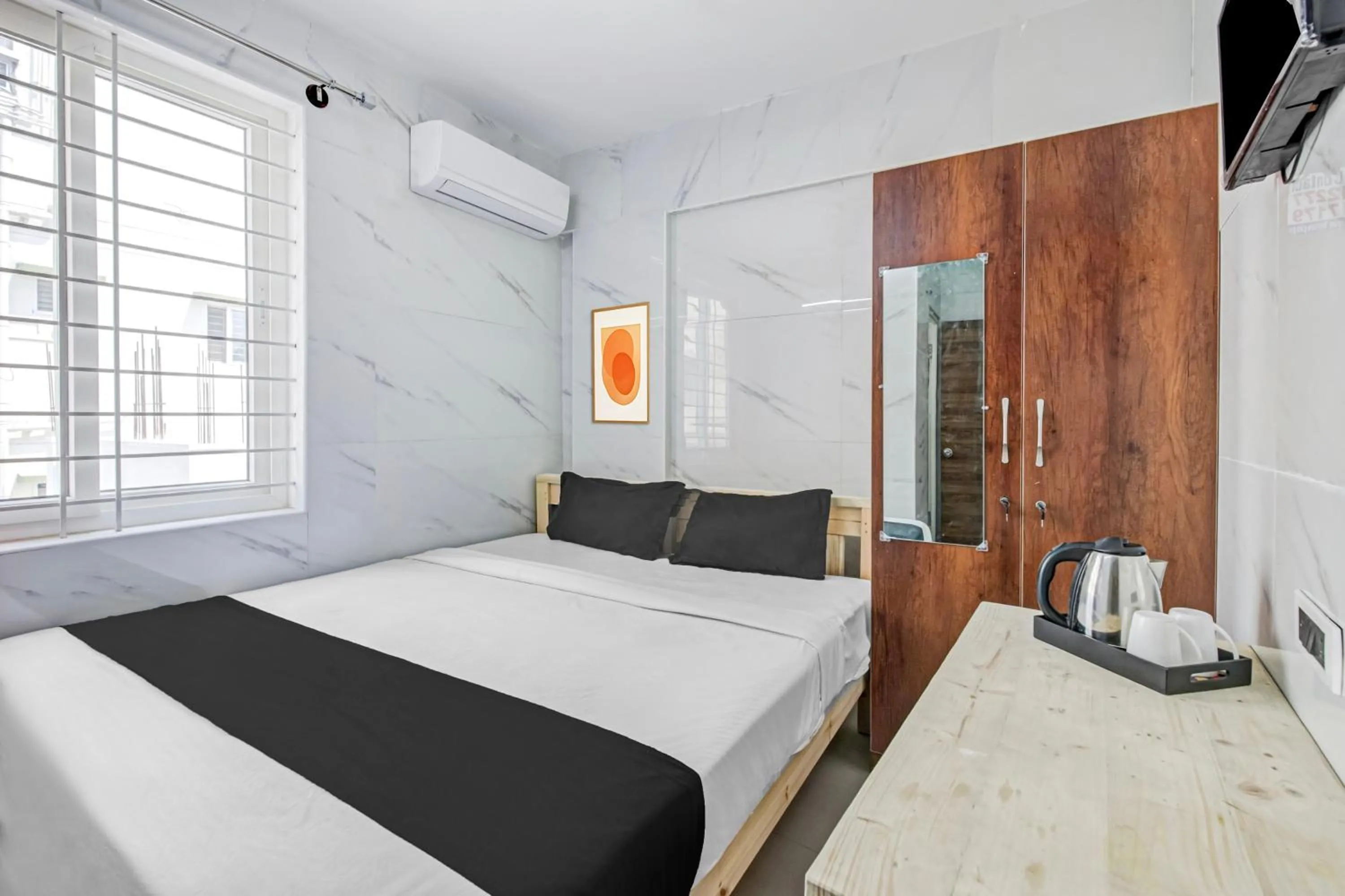 Bedroom in Collection O Sapthagiri Inn