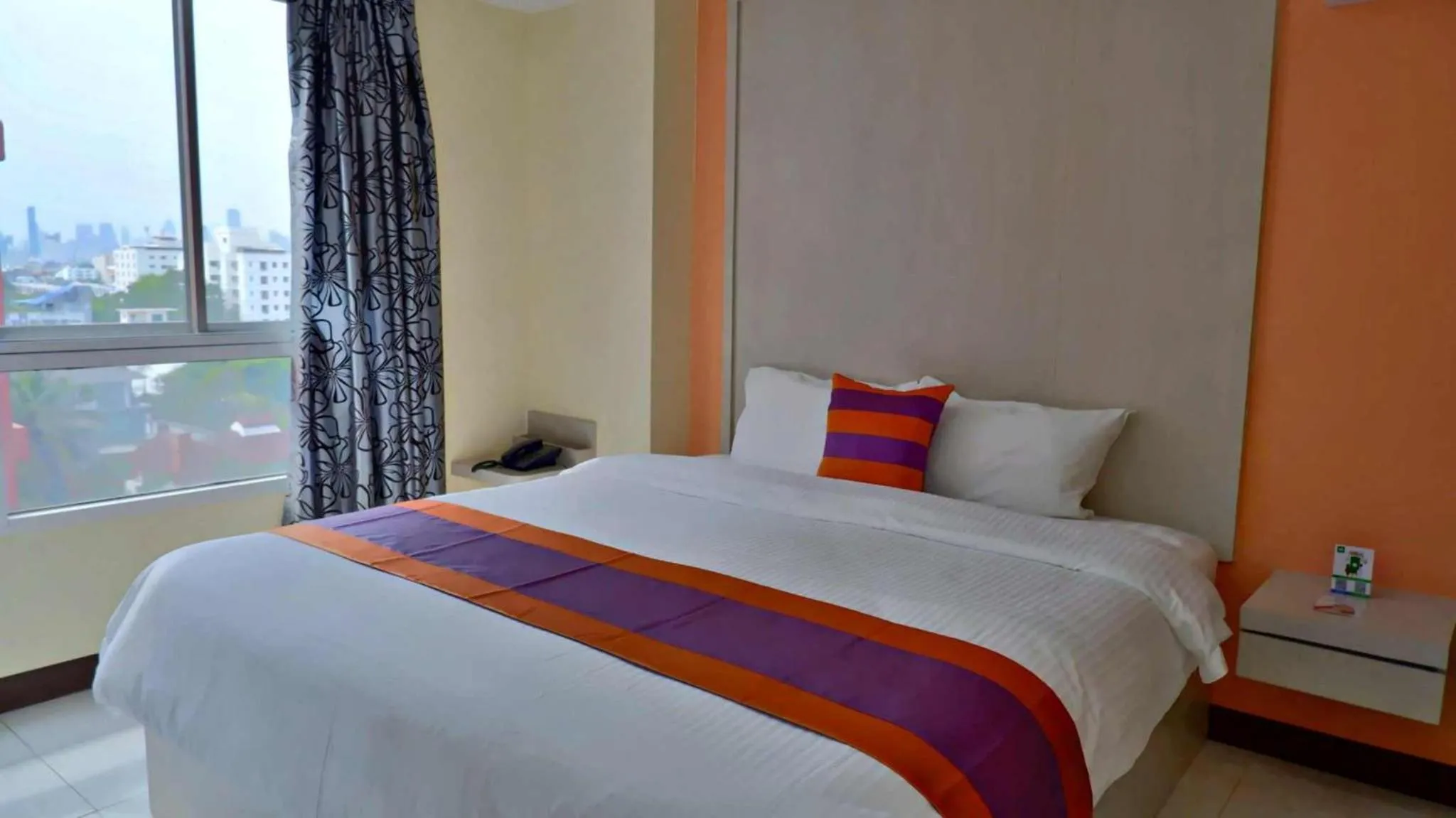 Bed in Aryan Suites Hotel