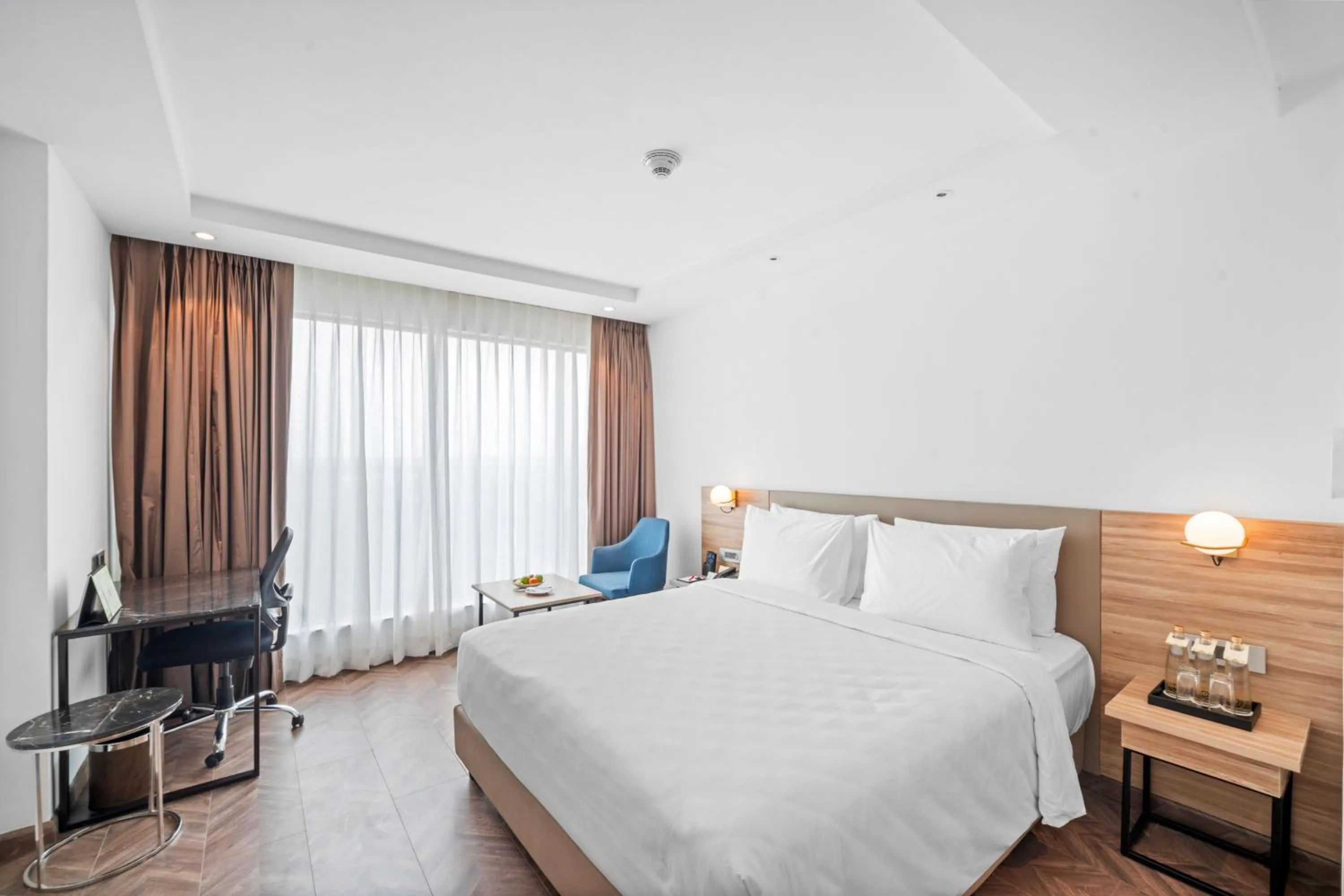 Photo of the whole room, Bed in Grand Vijayawada by GRT Hotels