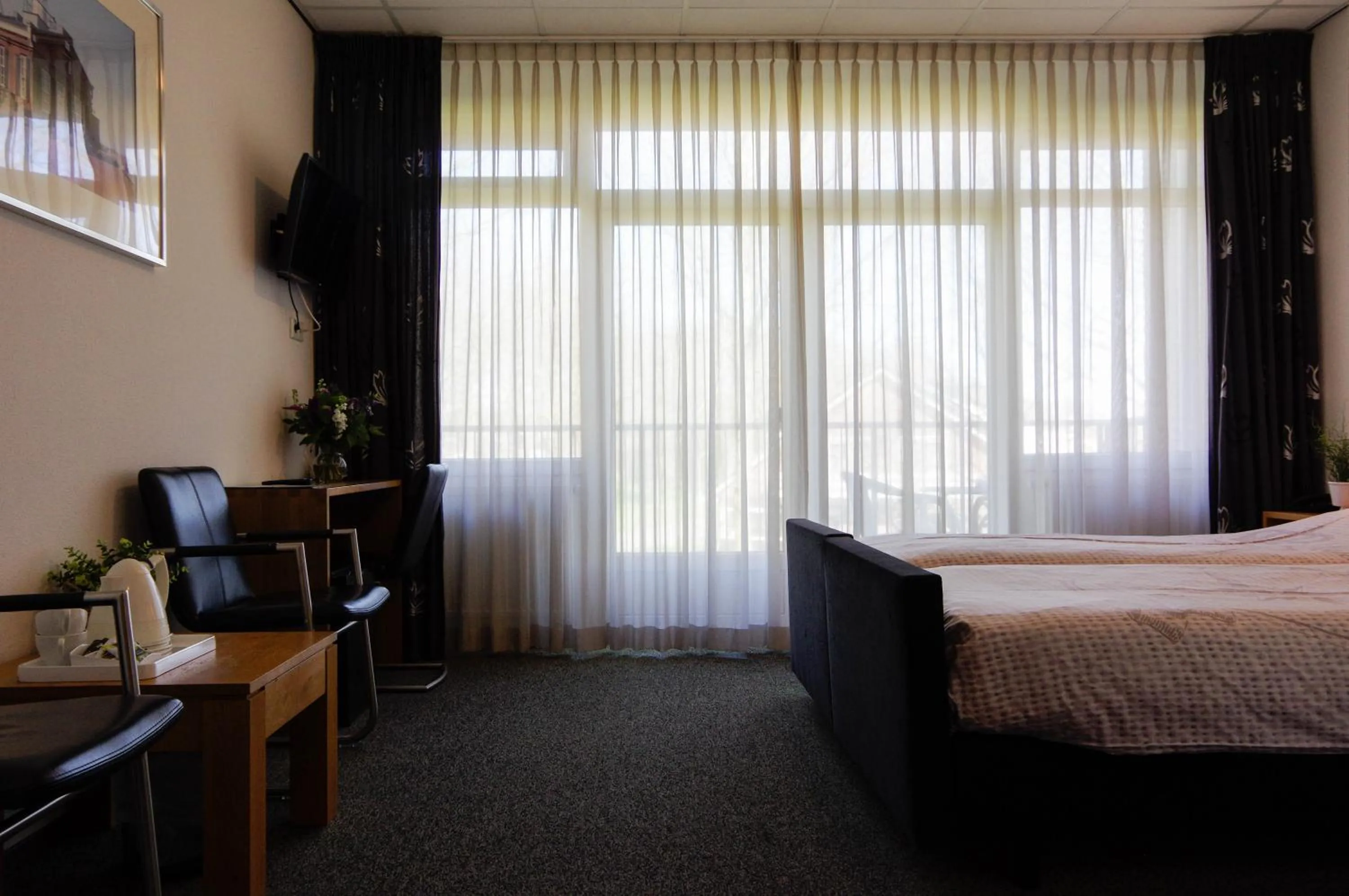 Bed in Hotel and Restaurant van Saaze