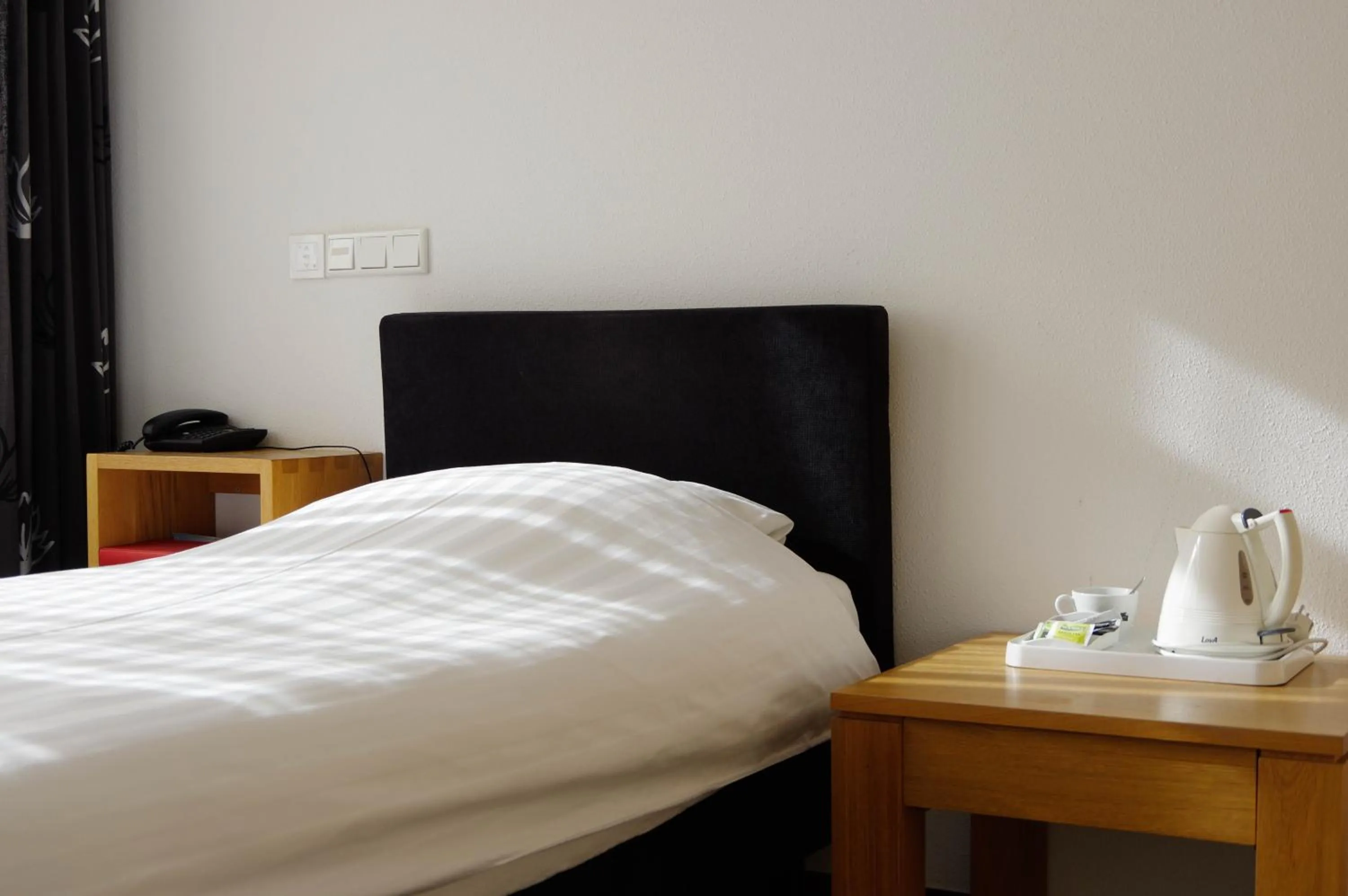 Bed in Hotel and Restaurant van Saaze