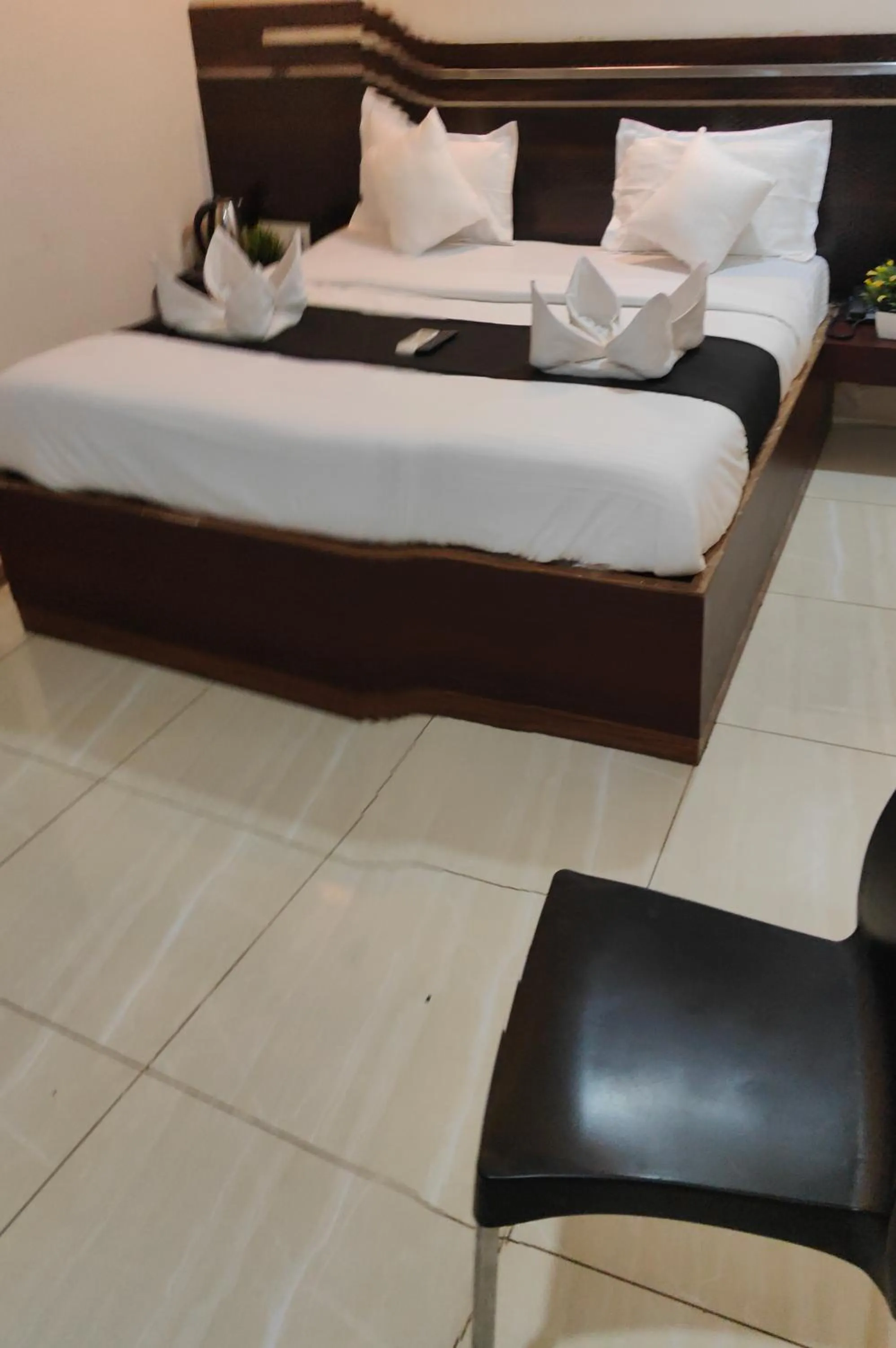 Bedroom, Bed in Hotel Shirdi Park Inn 80 Meters From Sai Samadhi Temple