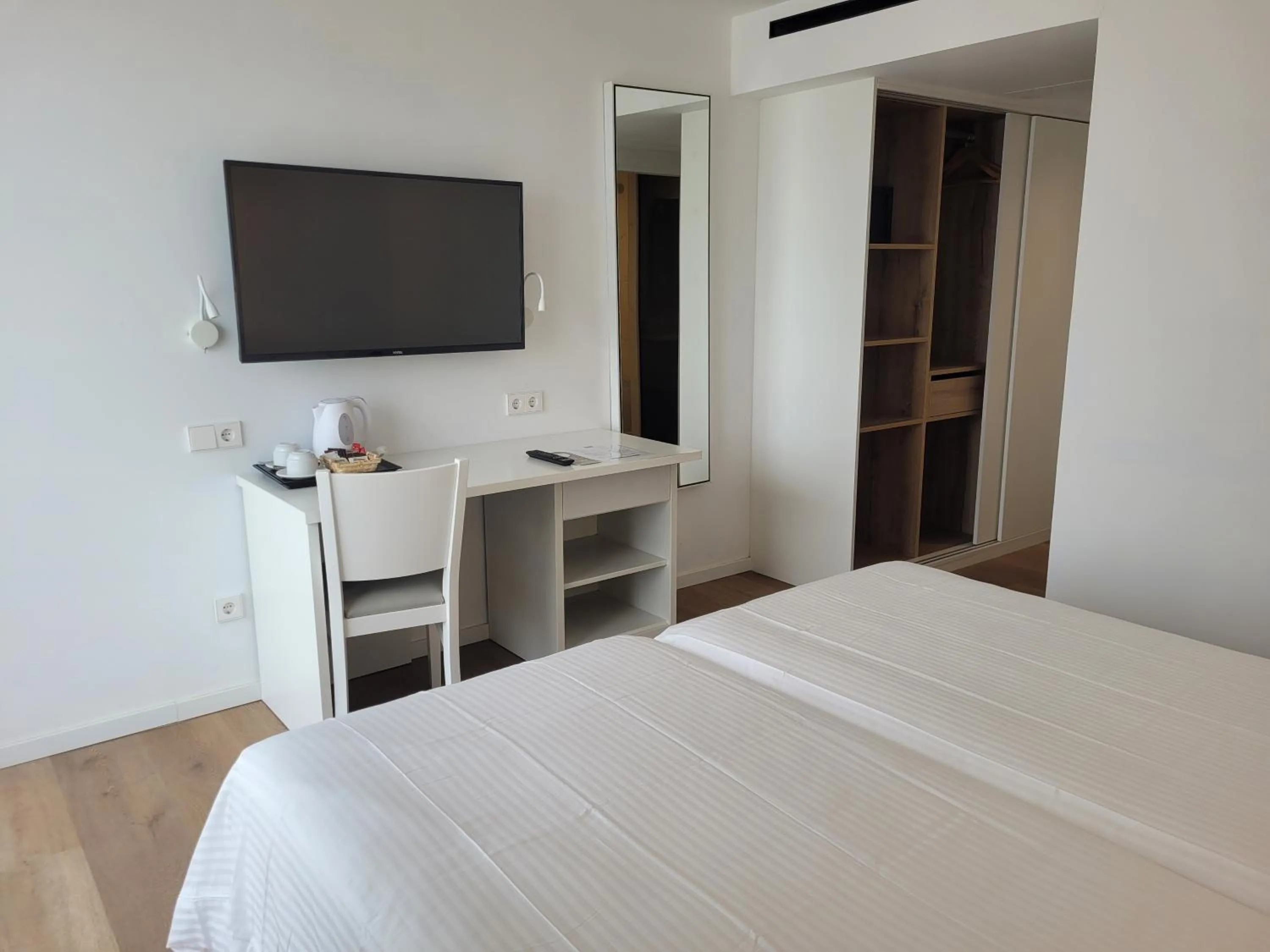 Photo of the whole room, TV/Entertainment Center in Paraiso Beach by Hoteles Centric -Adult Only