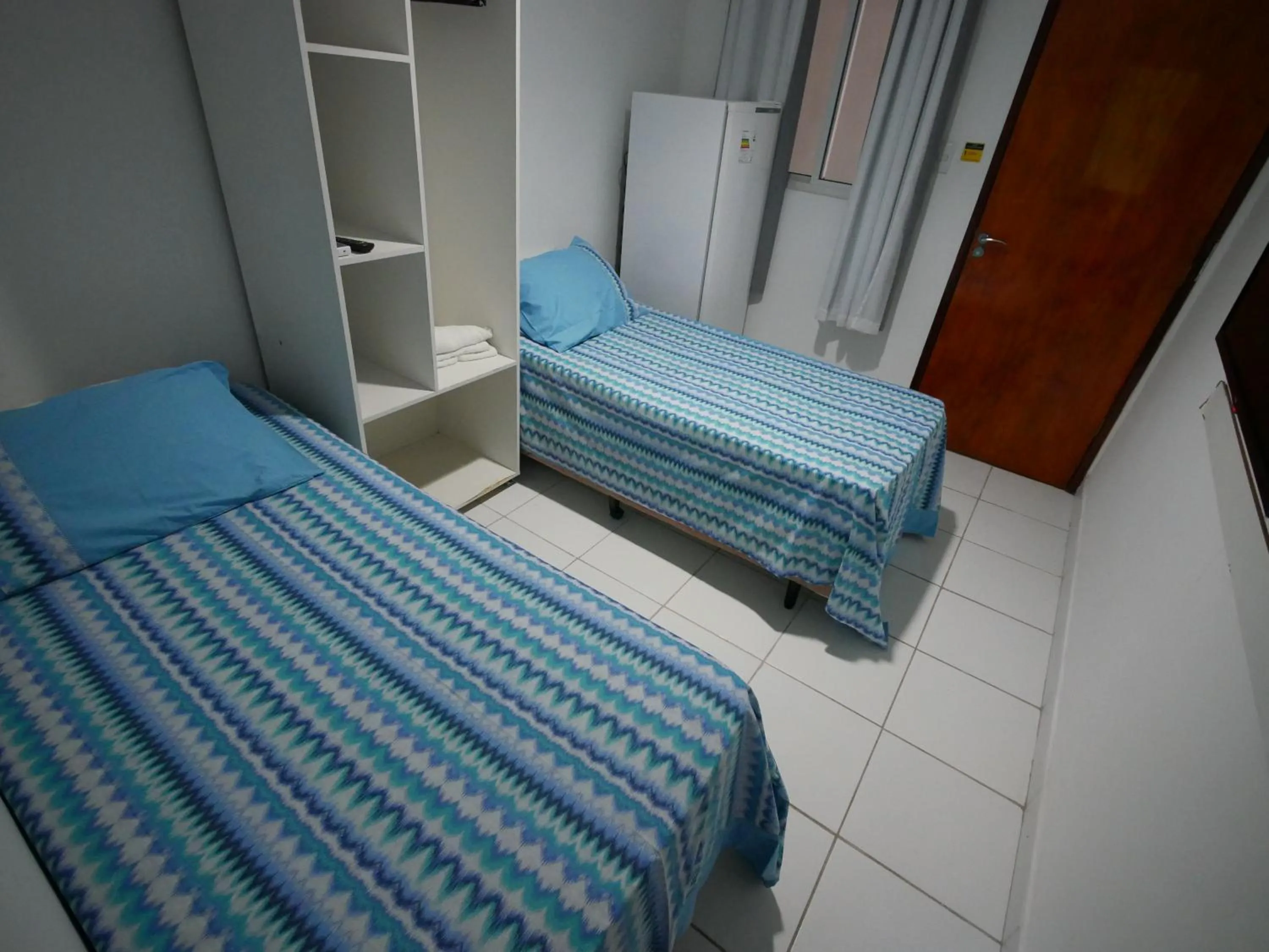 Bed in Pousada Brasileira