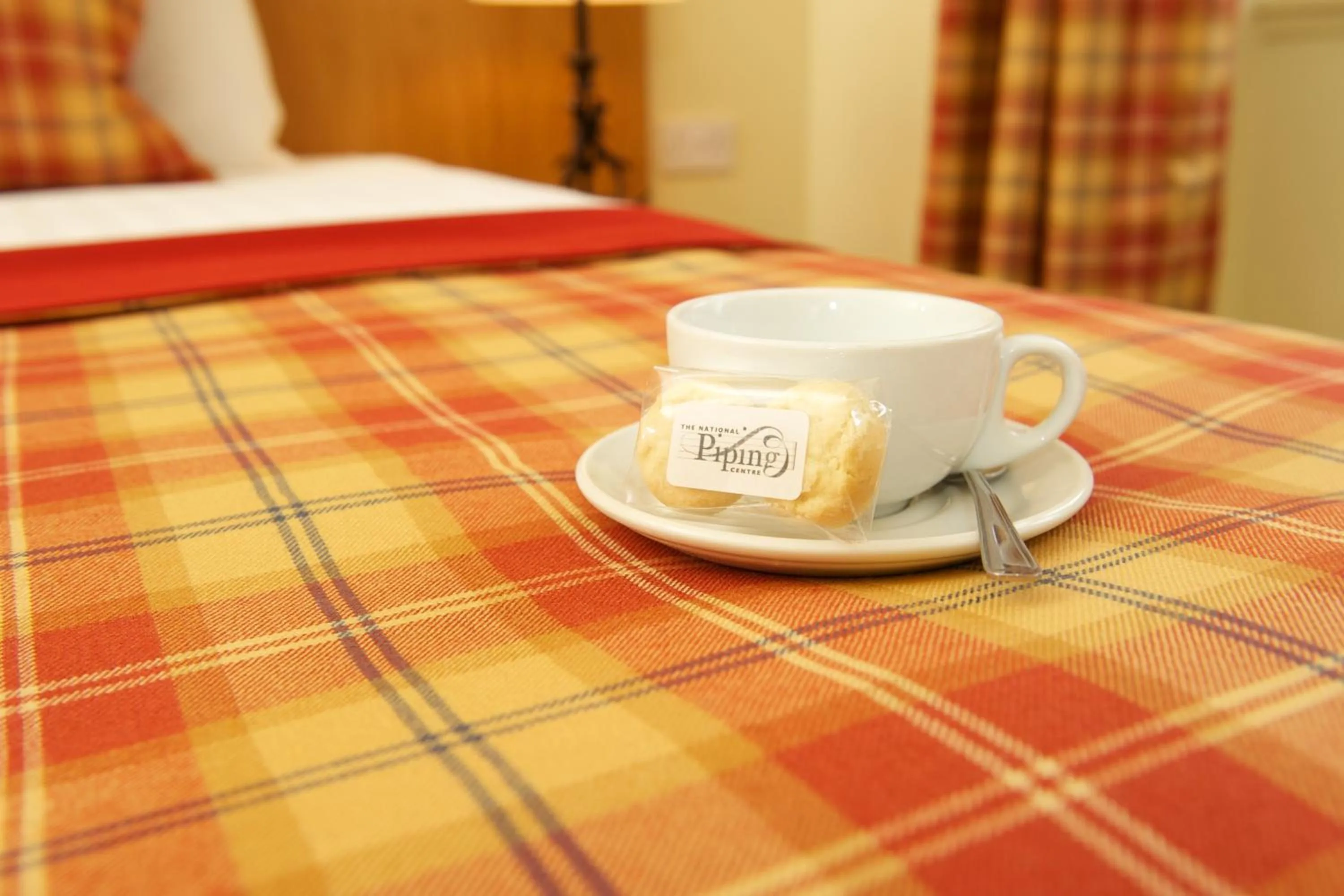 Bed in The Pipers' Tryst Hotel