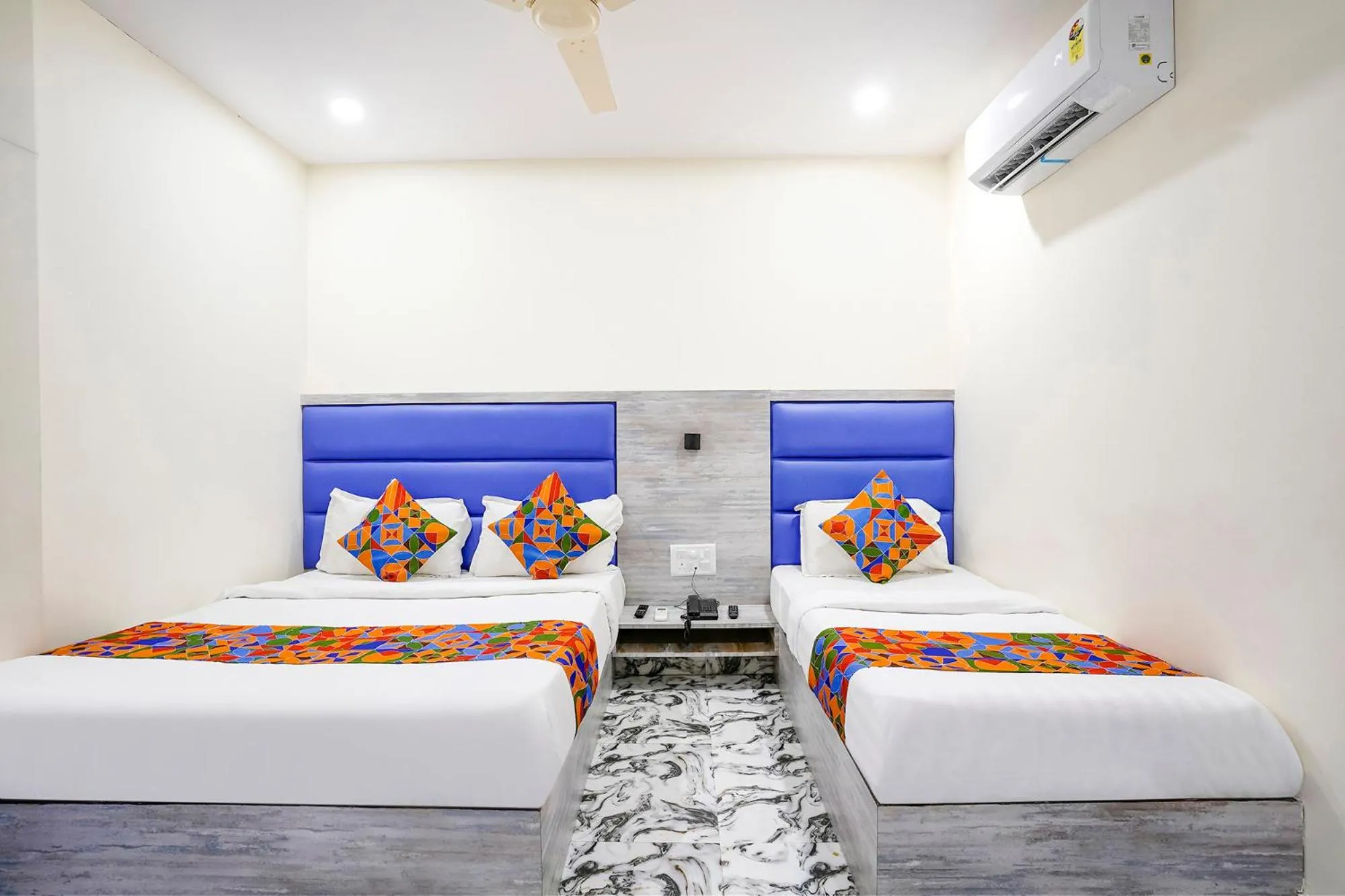 Bed in FabHotel Good Luck Residency