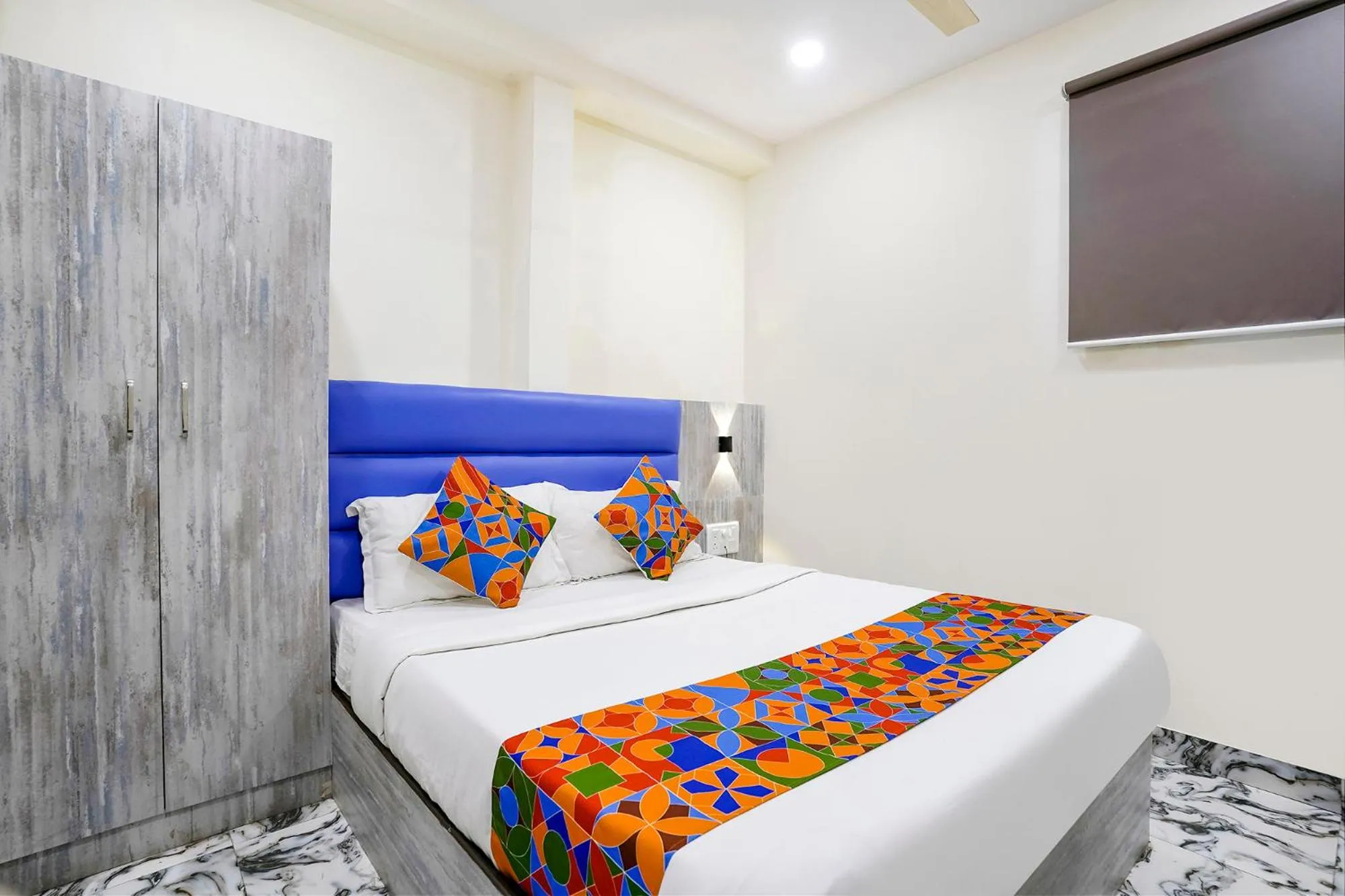 Bed in FabHotel Good Luck Residency