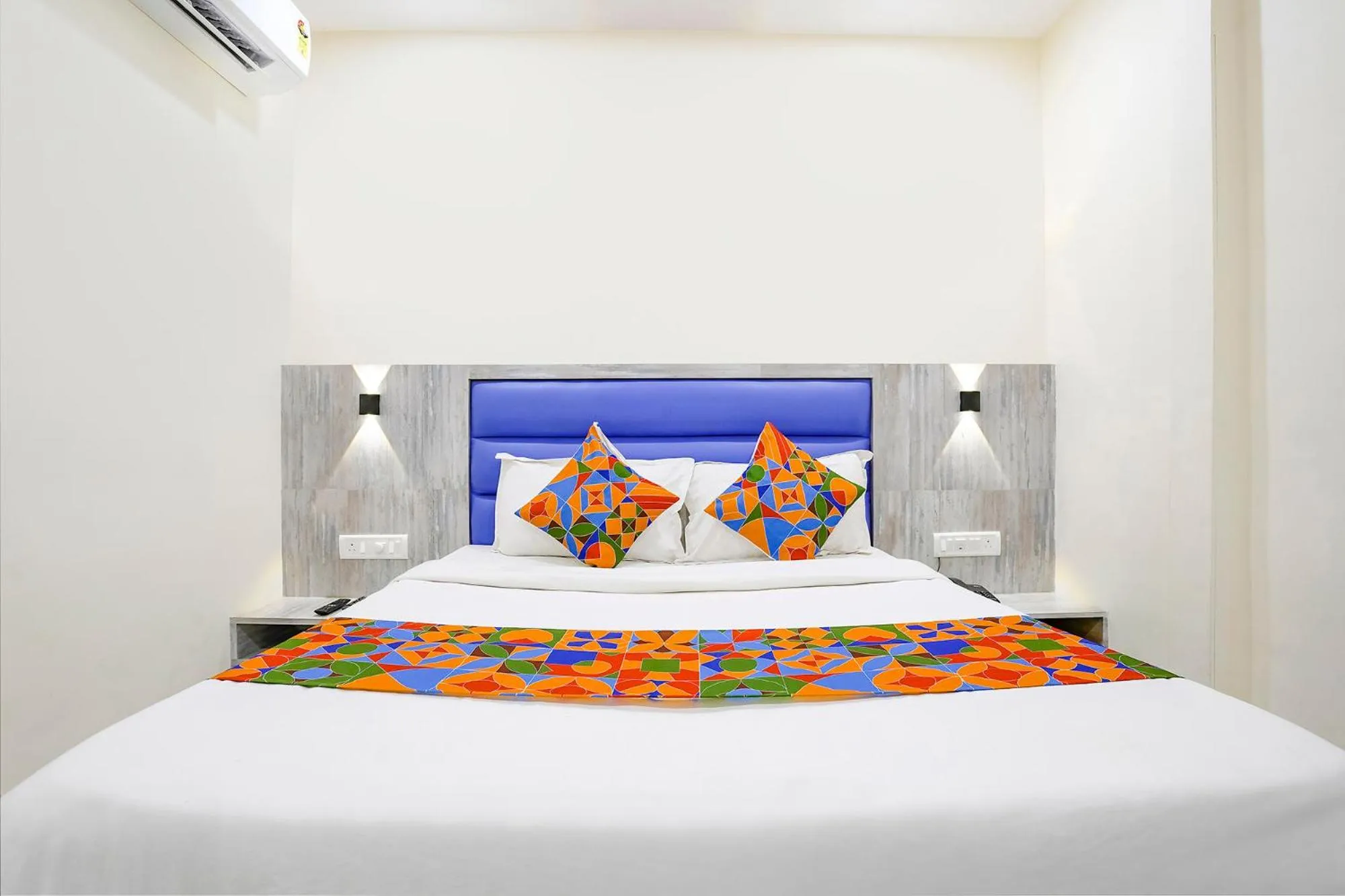 Bed in FabHotel Good Luck Residency