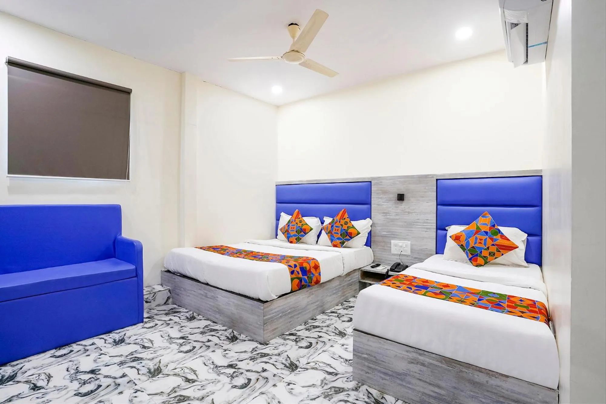 Bed in FabHotel Good Luck Residency