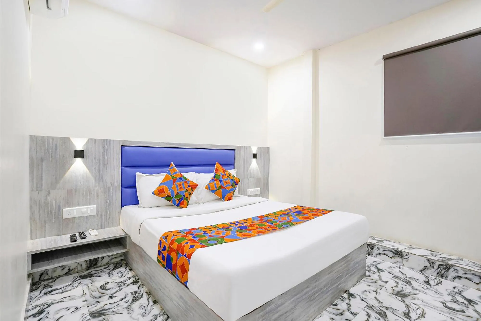 Bed in FabHotel Good Luck Residency