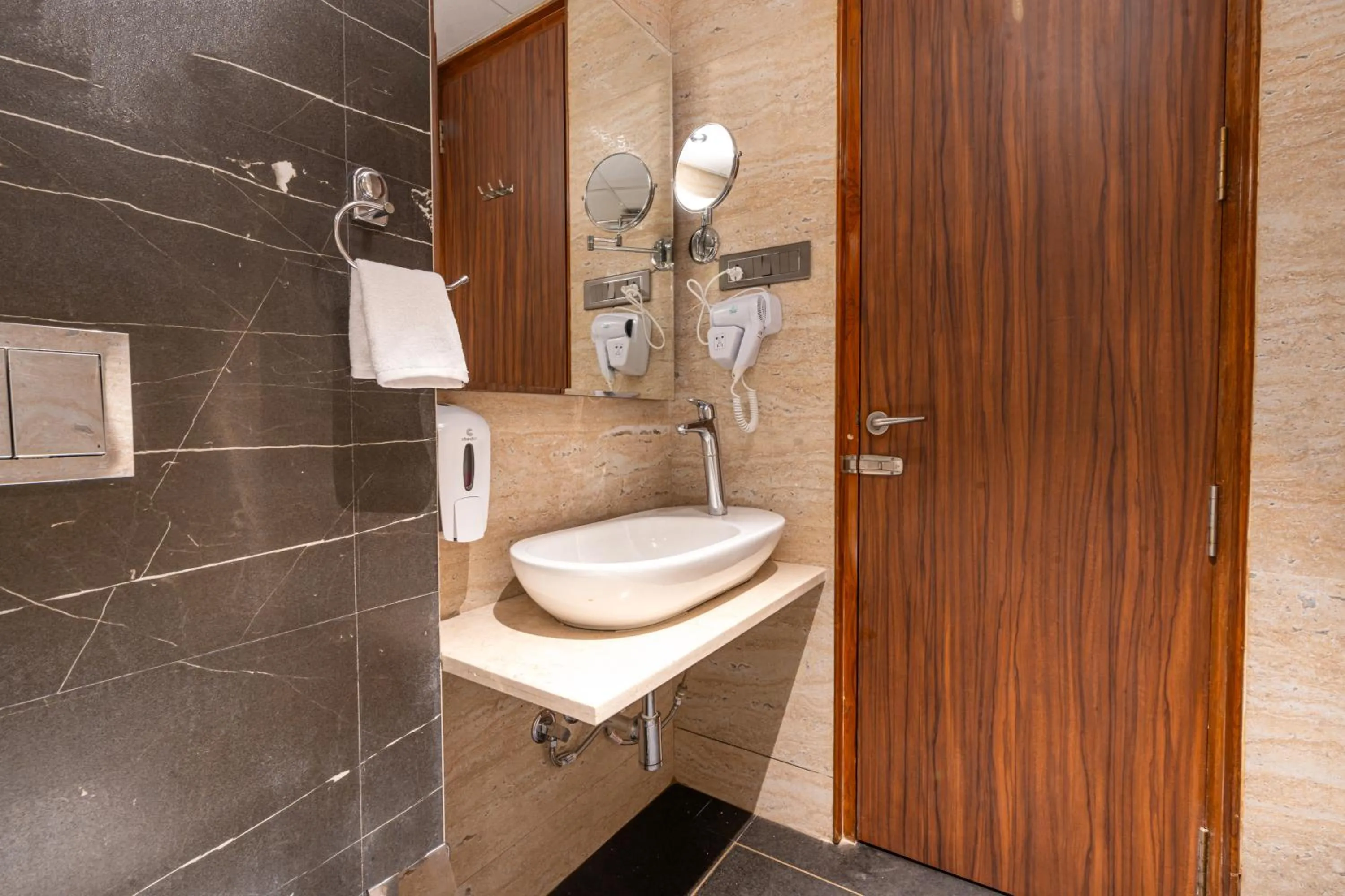 Bathroom in Treebo Premium Heritage Grand -Majiwada Thane