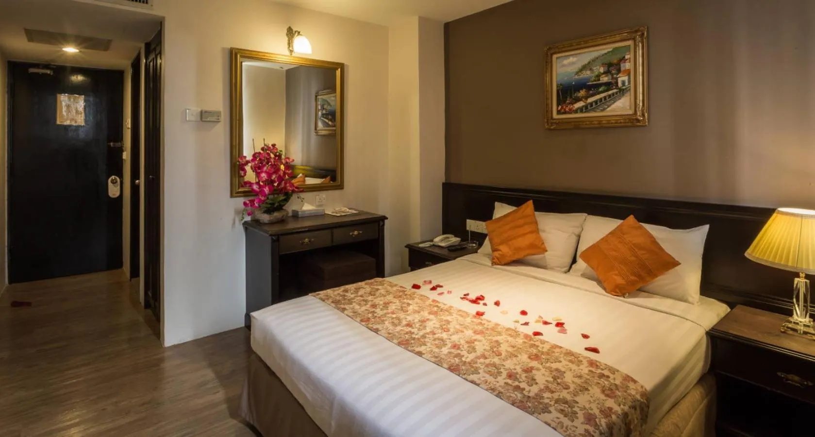 Bed in PJ De Inn Hotel