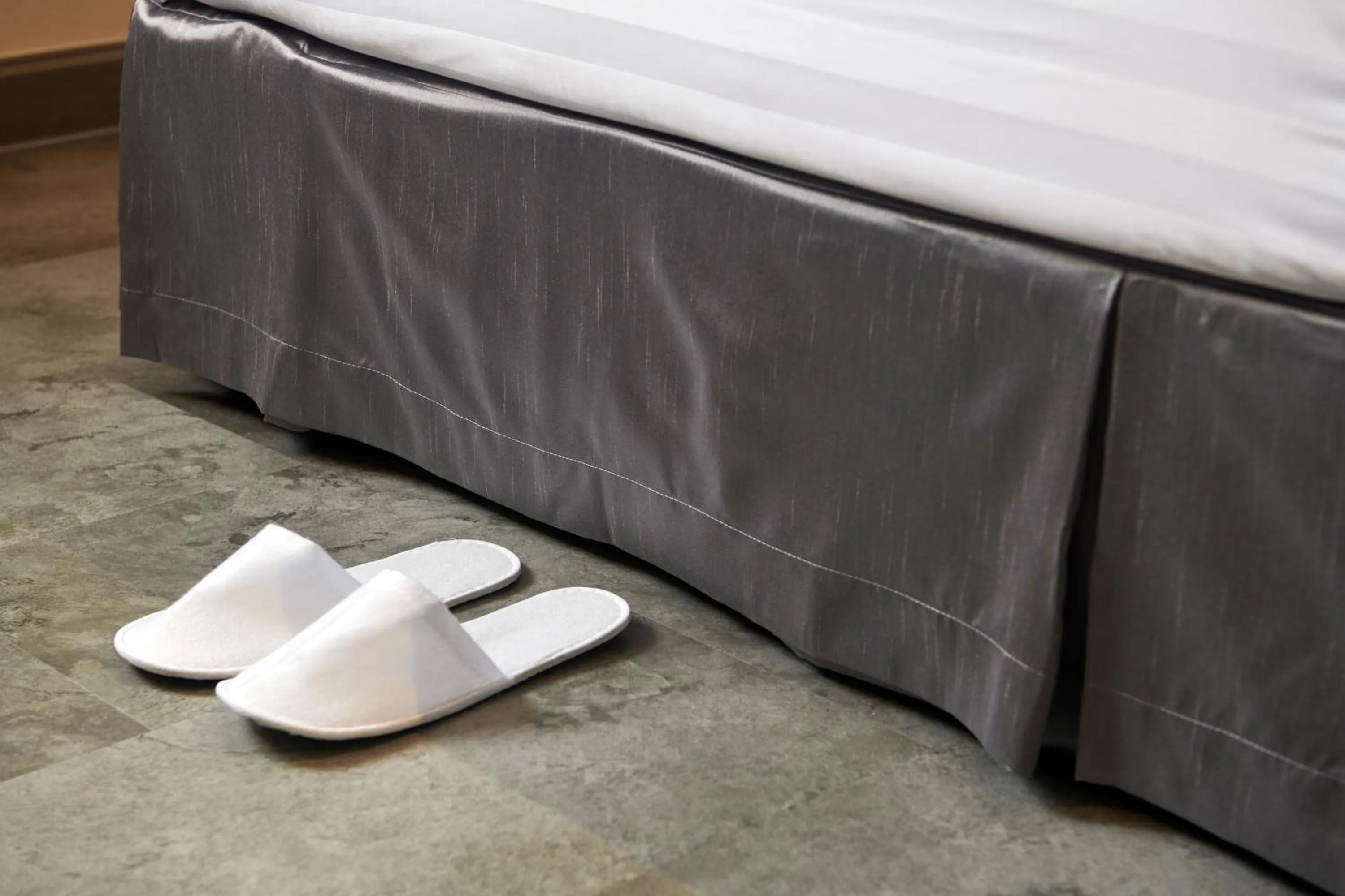 Bed in PJ De Inn Hotel