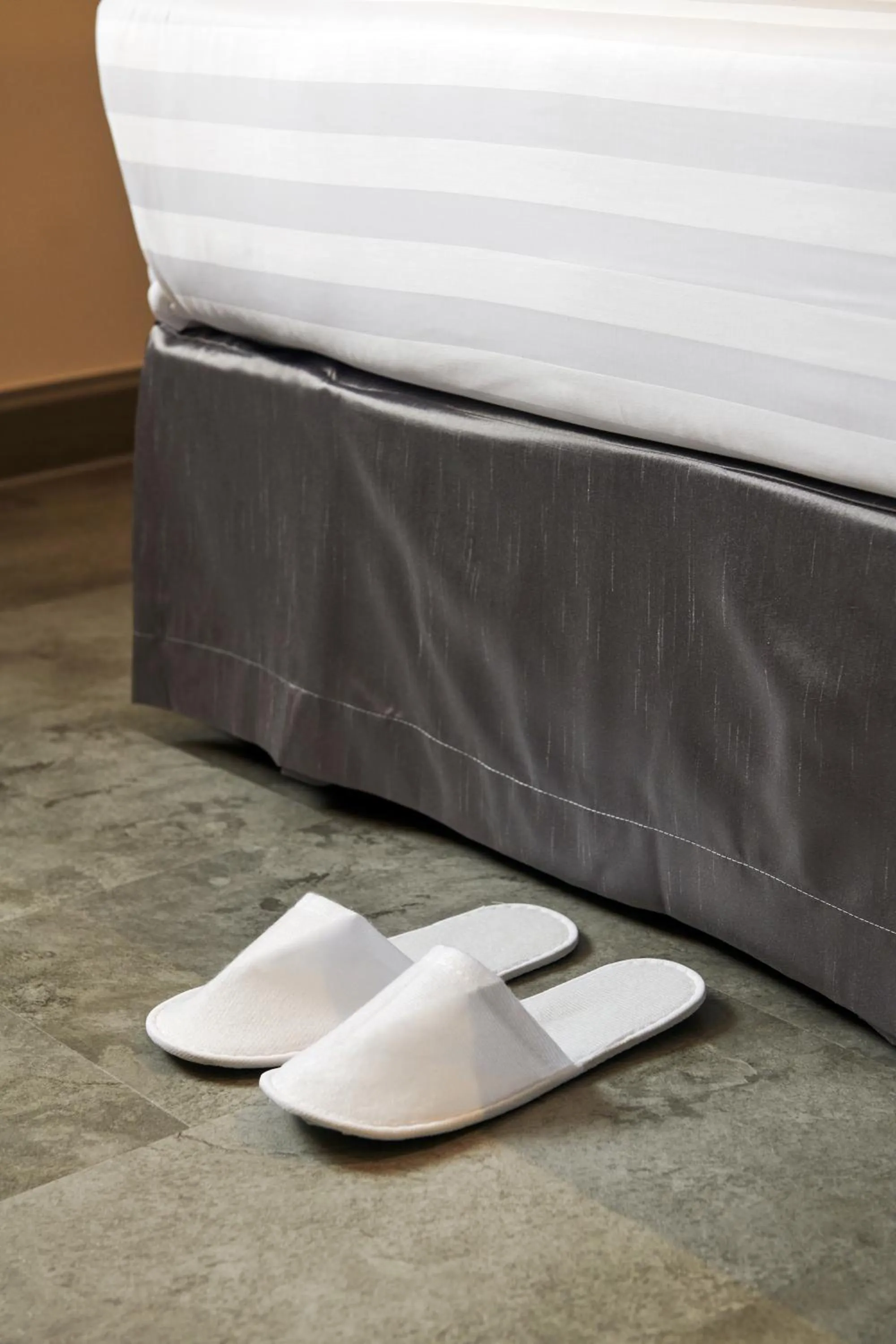 Bed in PJ De Inn Hotel