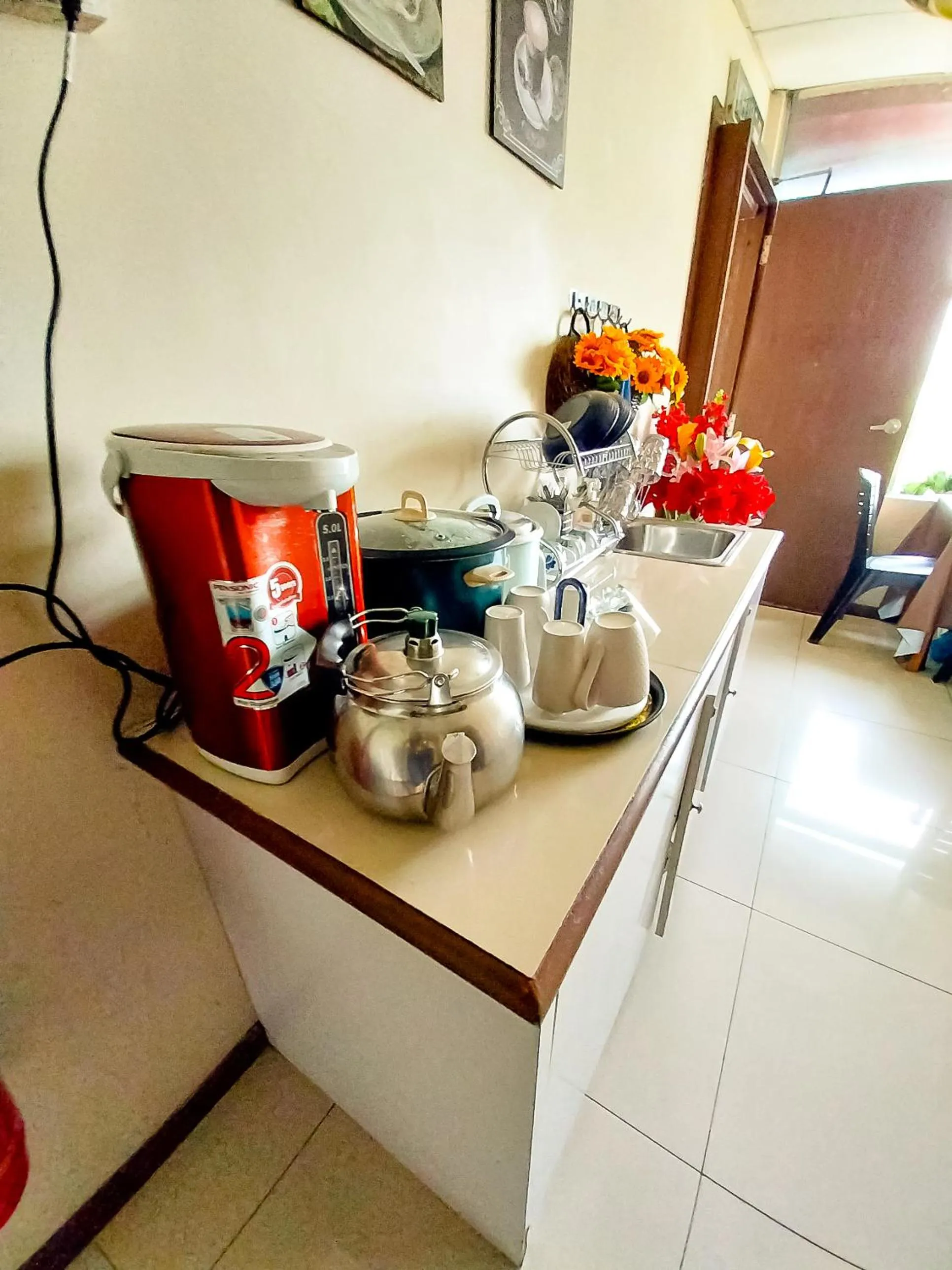 Kitchen or kitchenette in MB Budget Hotel