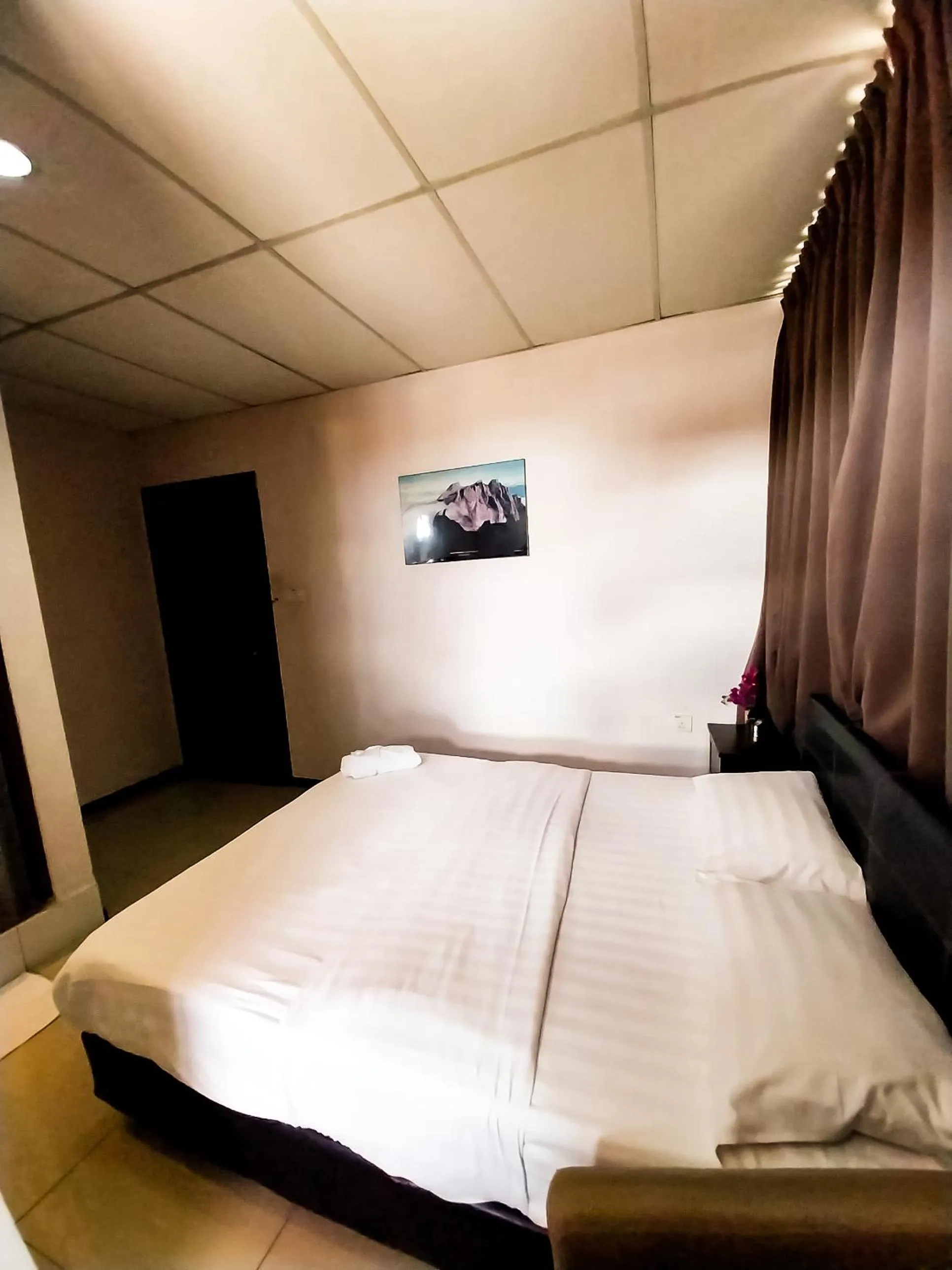 Bedroom in MB Budget Hotel